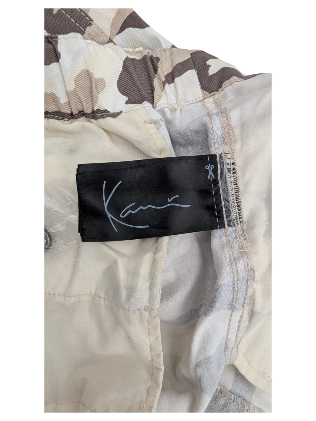 JAKE & IPI Karl Kani camouflage cargo pants in beige and brown. Cotton blend fabric.