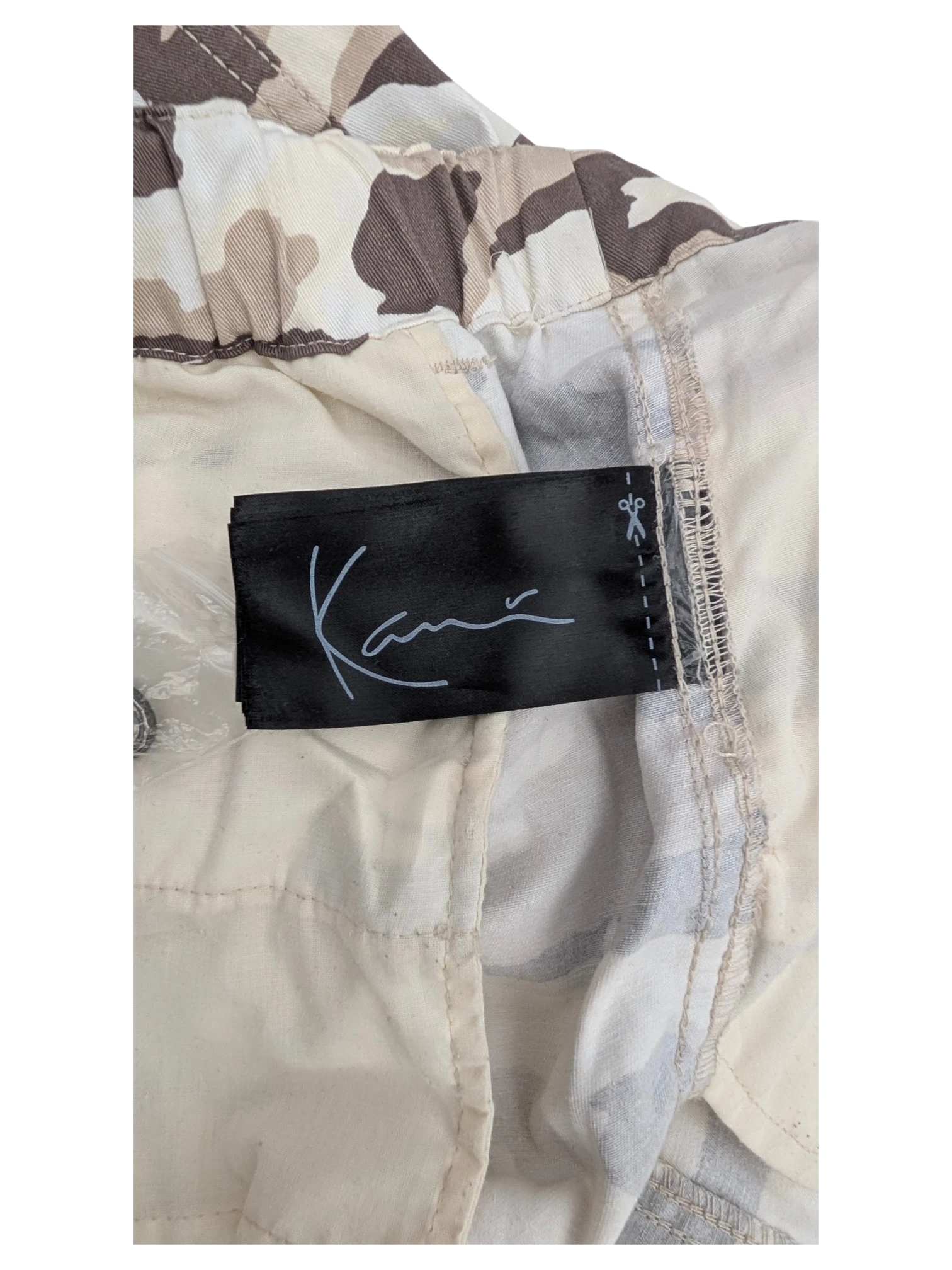 JAKE & IPI Karl Kani camouflage cargo pants in beige and brown. Cotton blend fabric.