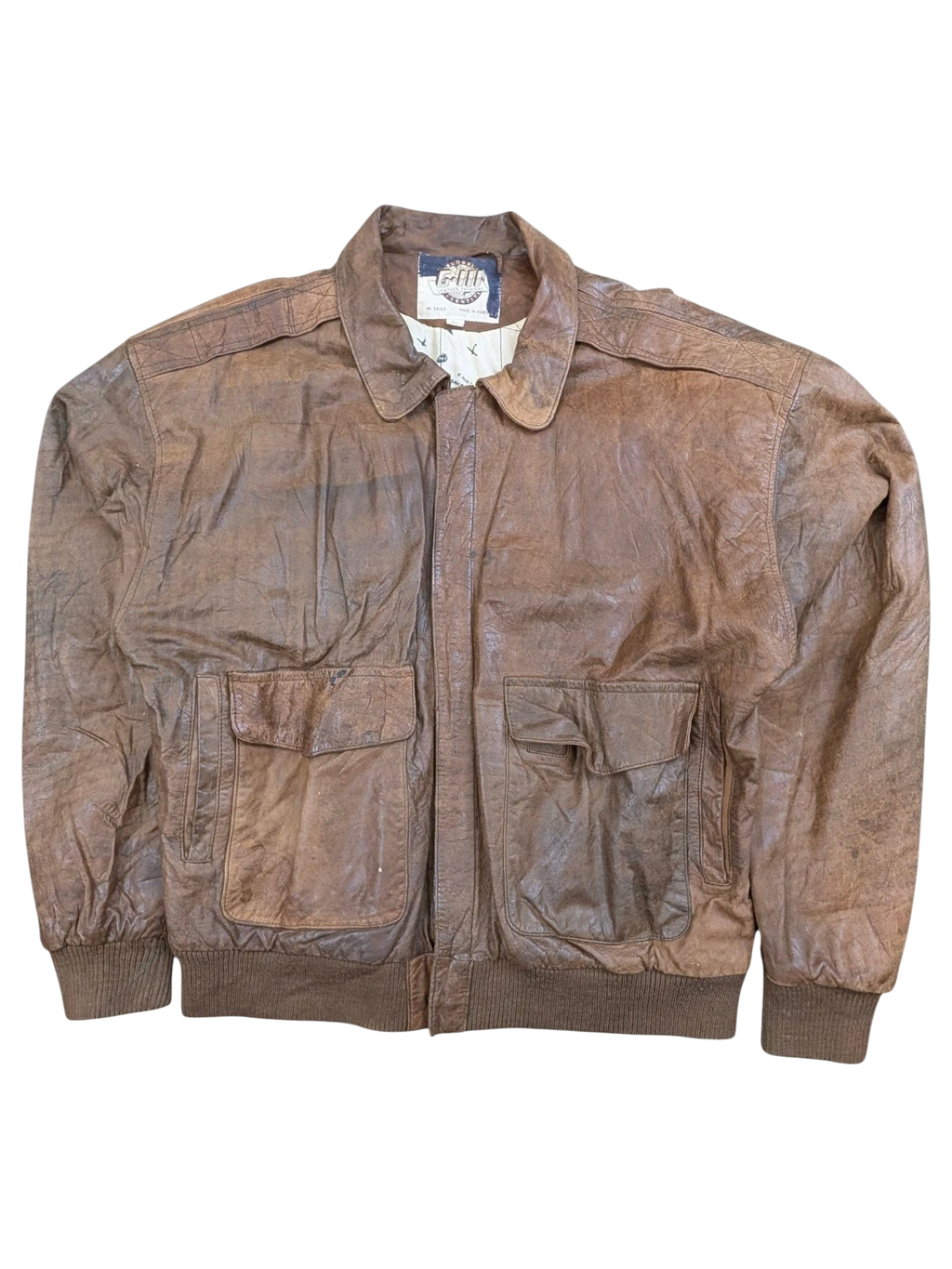 JAKE & IPI G-III leather bomber jacket in brown with two chest pockets and ribbed cuffs.
