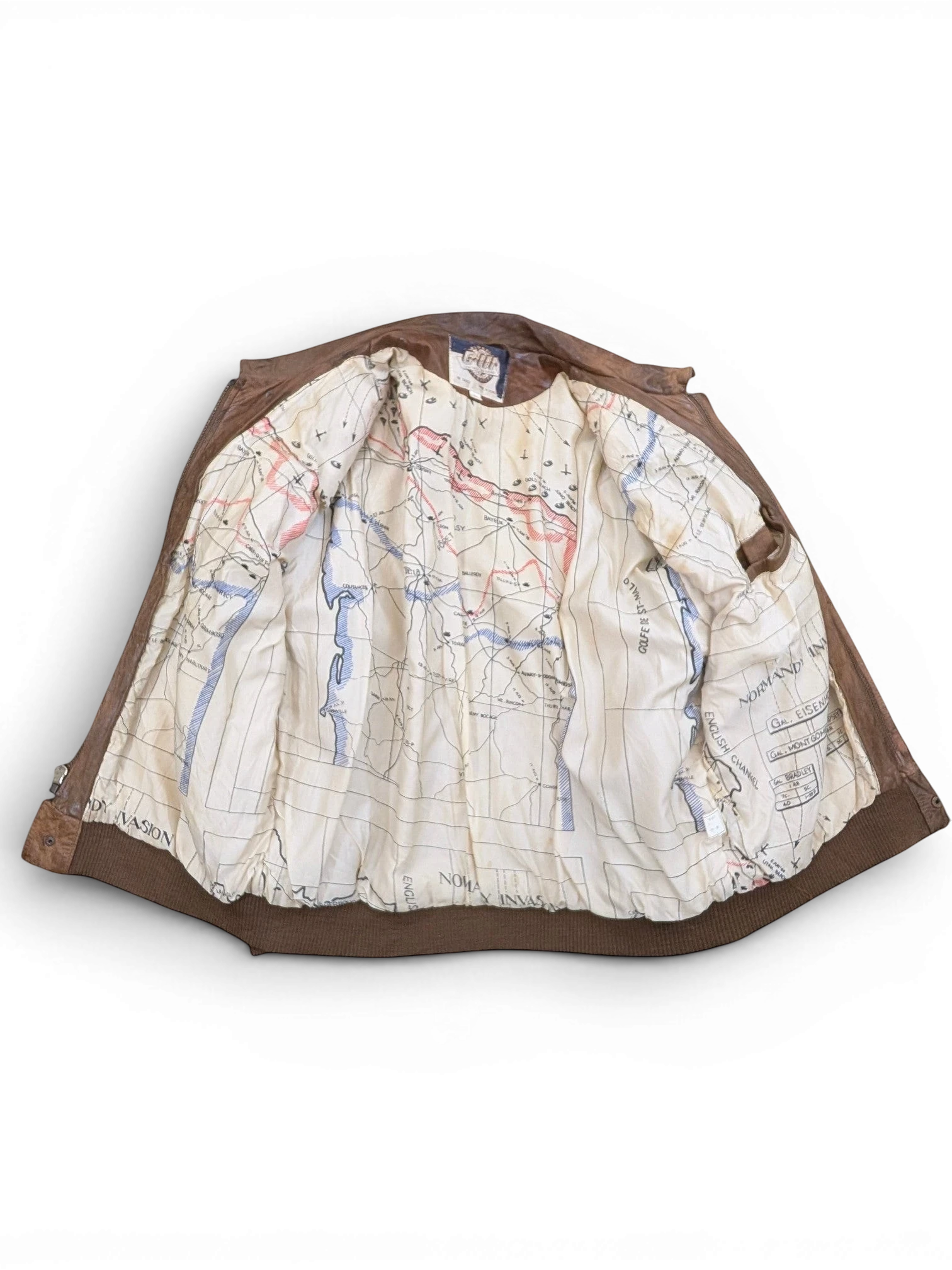 JAKE & IPI brown leather bomber jacket with a detailed map lining of the Normandy invasion.