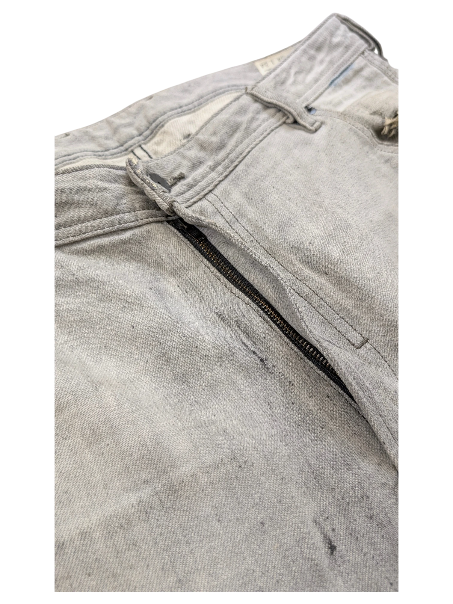 JAKE & IPI light grey distressed denim jeans with zip fly and button closure, size W34 L34.