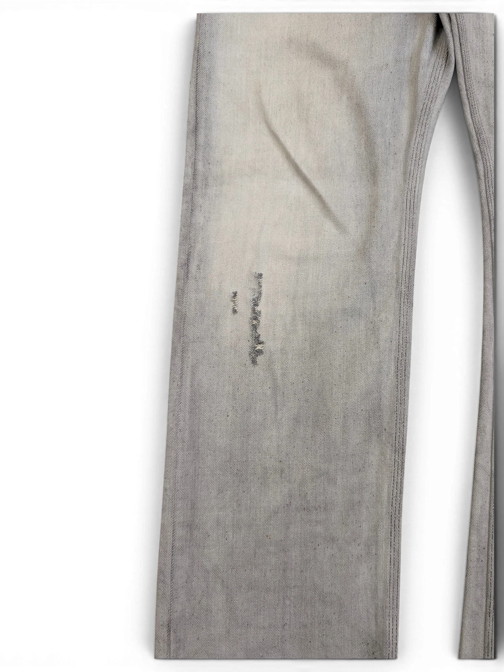 JAKE & IPI light grey distressed denim jeans with a slim fit and subtle fading.