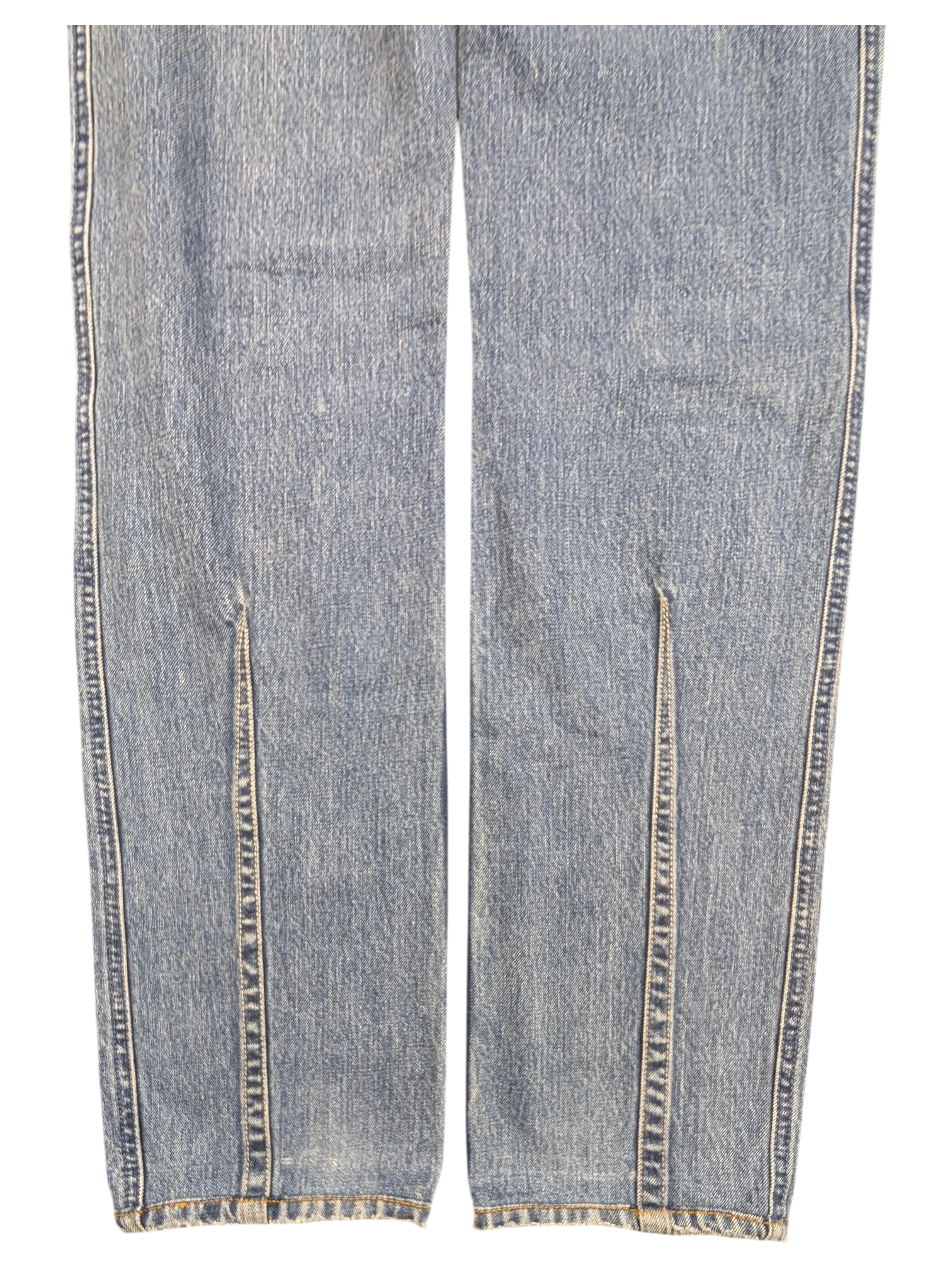 JAKE & IPI light wash denim jeans with front leg slits and frayed hems.