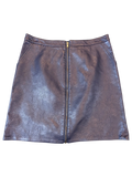 NAF NAF faux leather mini skirt in black with a full-length front zipper, available at JAKE & IPI.