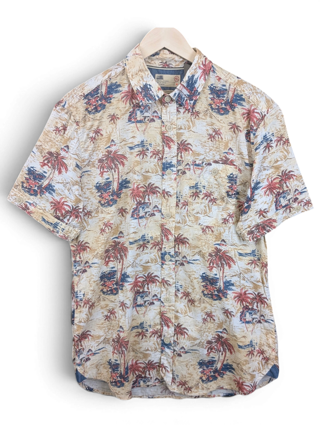 JAKE & IPI North Coast Hawaiian shirt in beige with a tropical palm tree print, short sleeves, and button-down front.