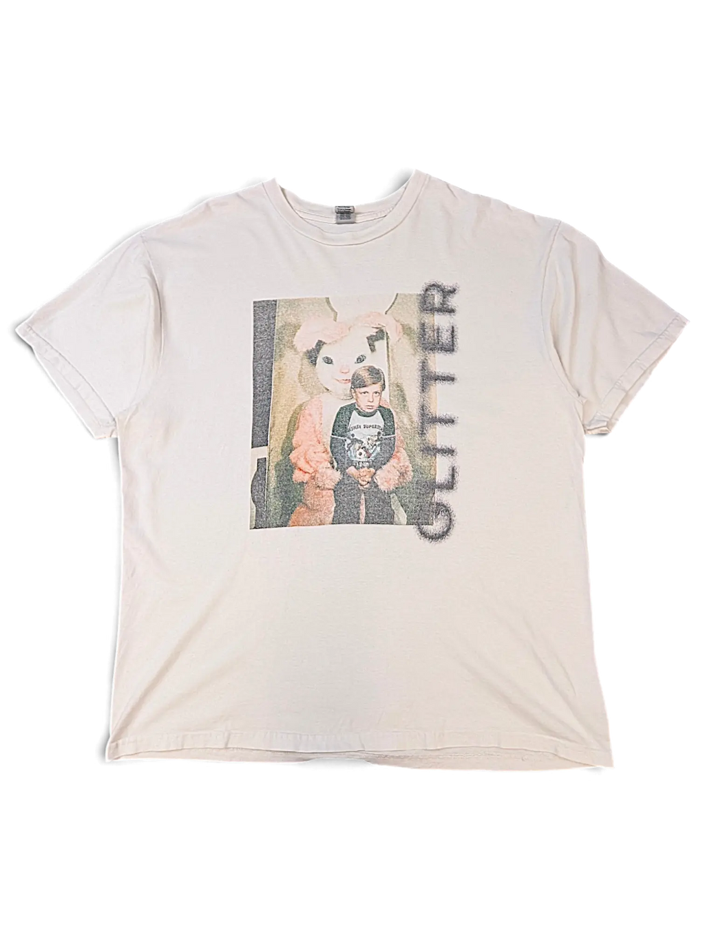 JAKE & IPI off-white cotton t-shirt featuring a vintage-style graphic of a child with a bunny mascot and glitter text