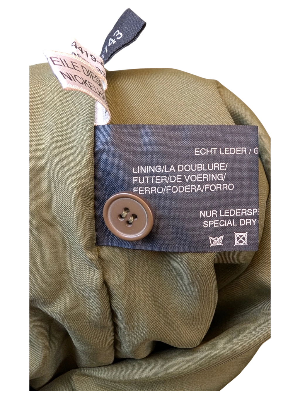 JAKE & IPI Apart Fashion olive green suede skirt interior label with spare button and care instructions