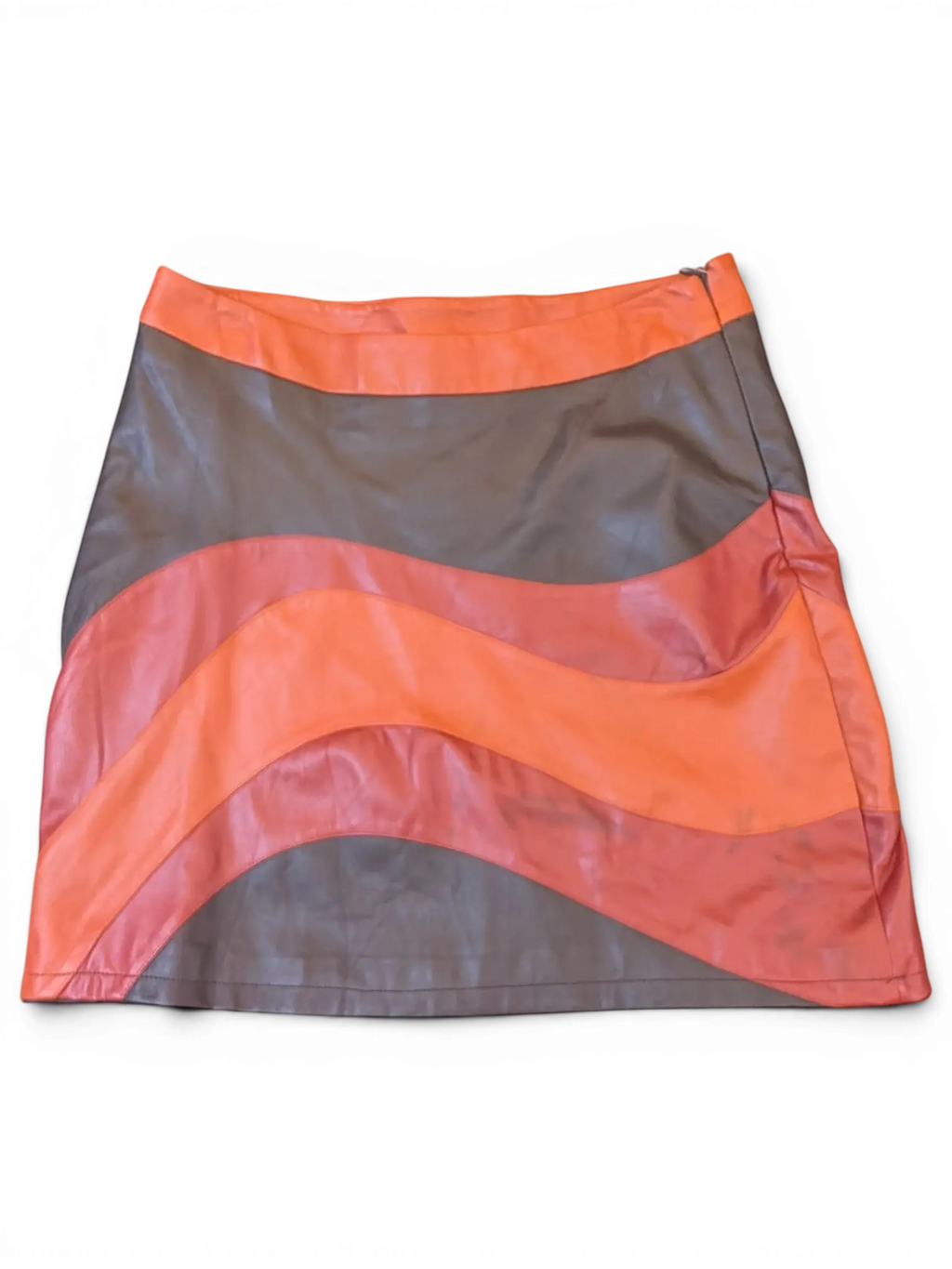 JAKE & IPI neon rose and brown paneled faux leather mini skirt with a wavy color-block design.