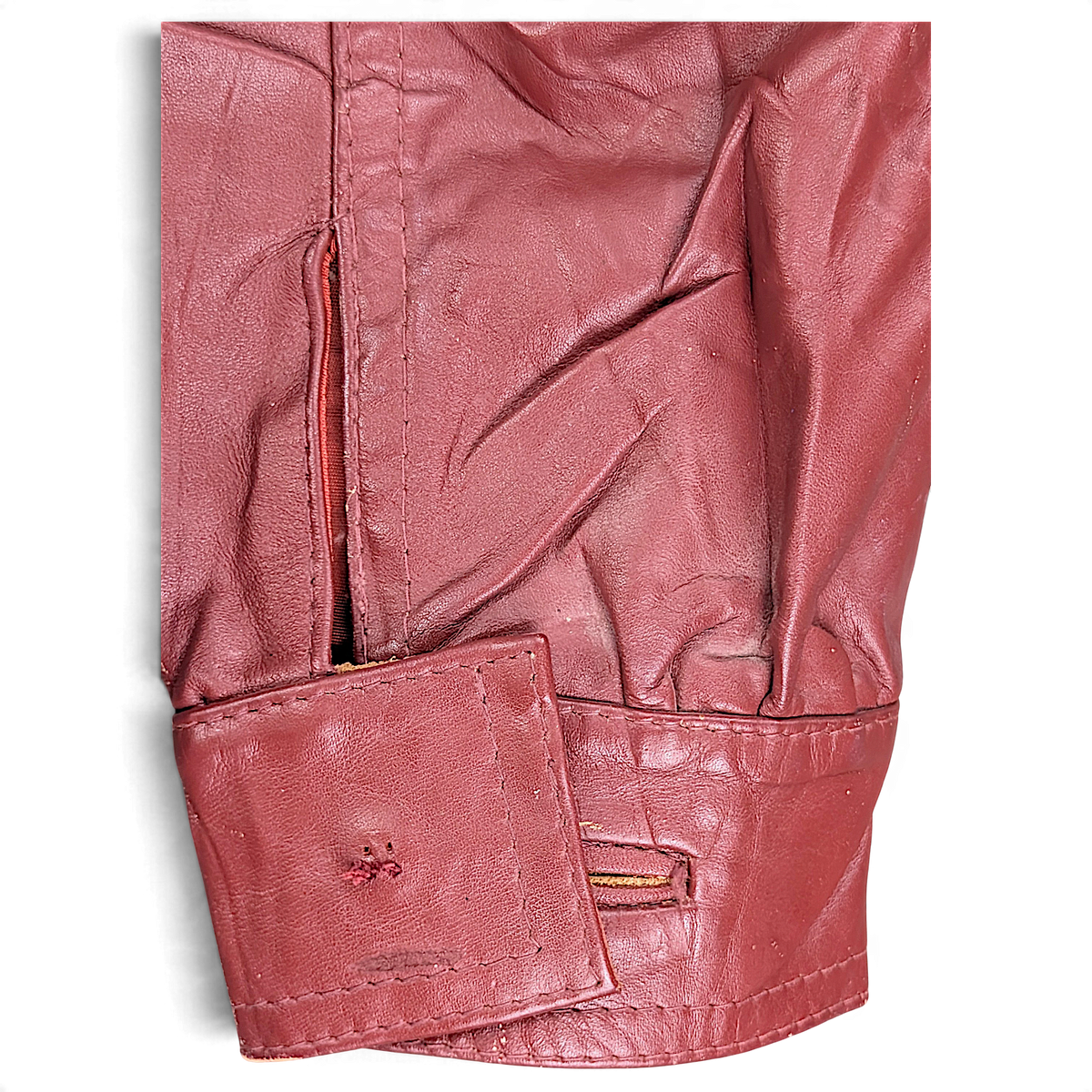 Vintage Red Genuine Leather Jacket Made in Uruguay – 14 – cuff button and wear.