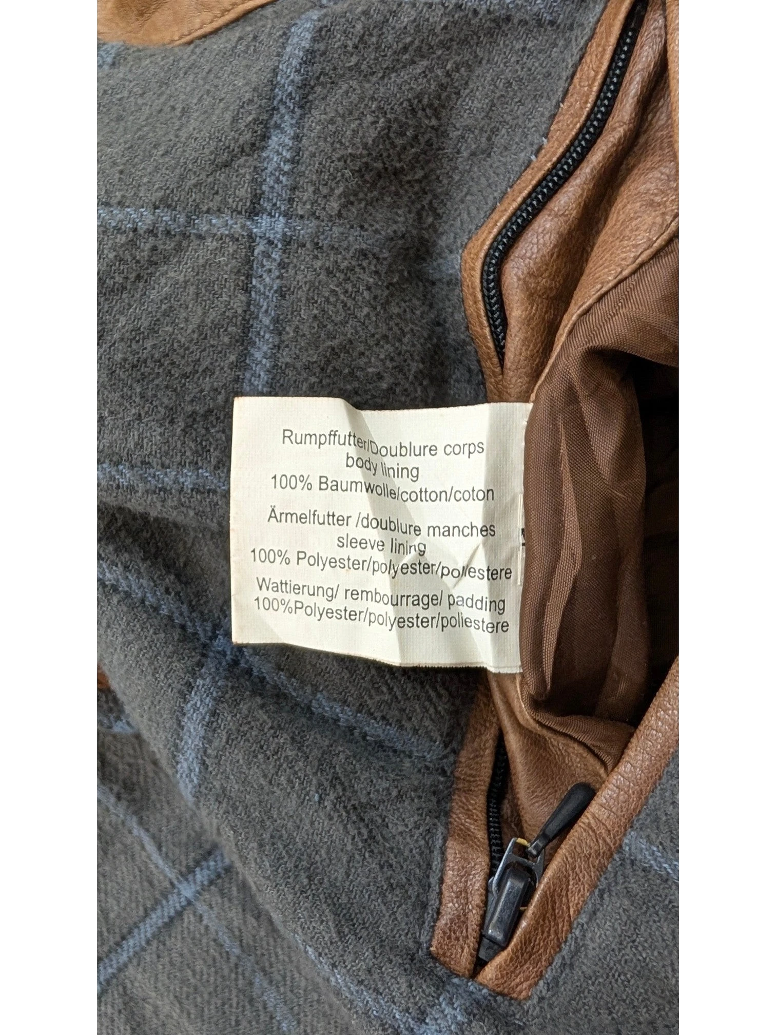 JAKE & IPI Q-21 leather jacket with grey plaid wool lining and brown leather trim.