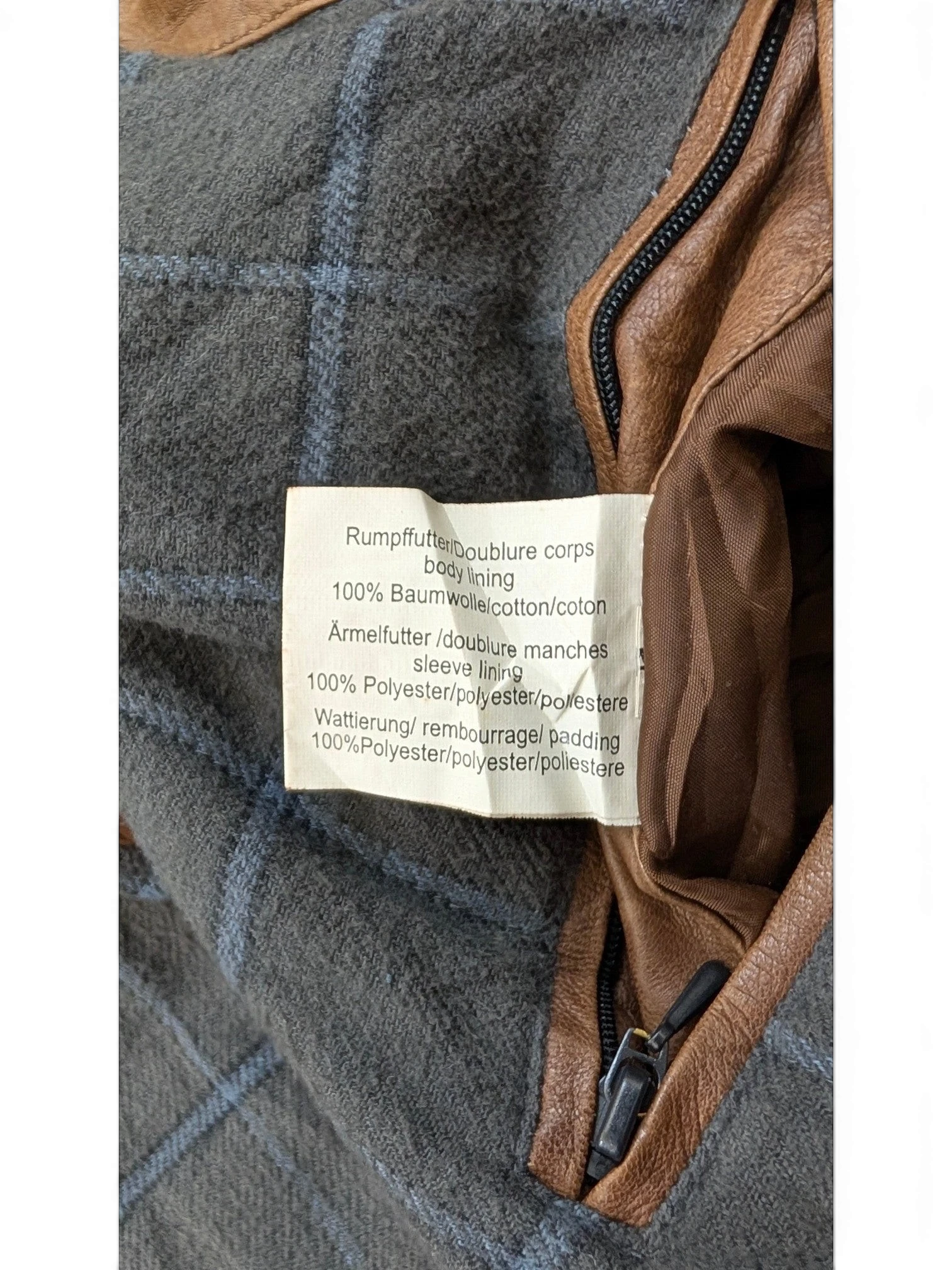 JAKE & IPI Q-21 leather jacket with grey plaid wool lining and brown leather trim.