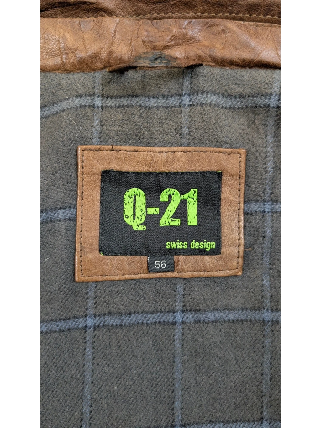 JAKE & IPI Q-21 leather jacket with plaid lining and size 56 tag.