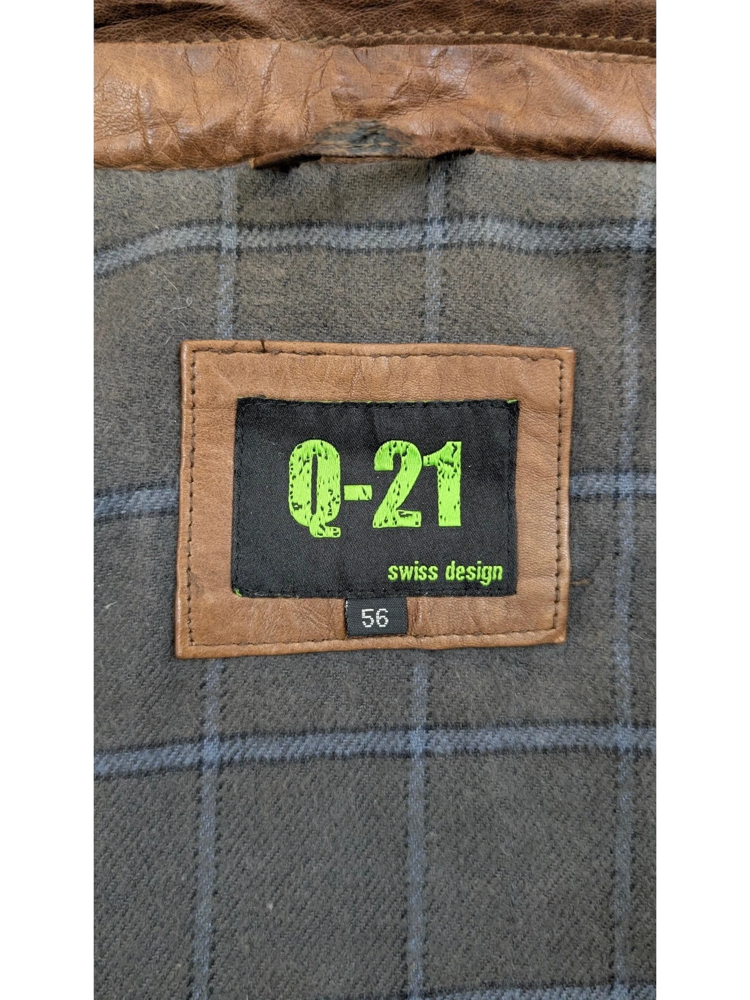 JAKE & IPI Q-21 leather jacket with plaid lining and size 56 tag.
