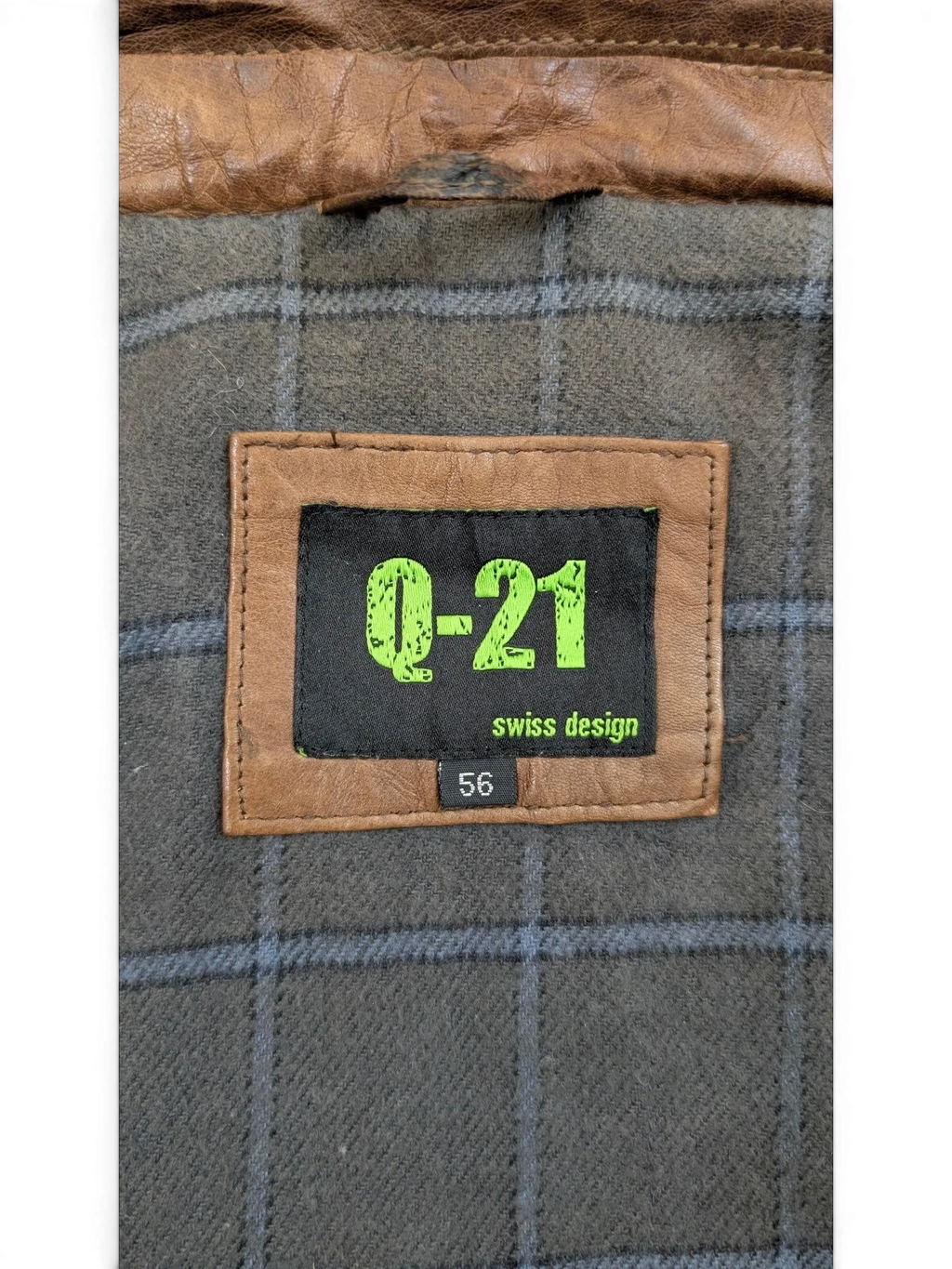 JAKE & IPI Q-21 leather jacket with plaid lining and size 56 tag.