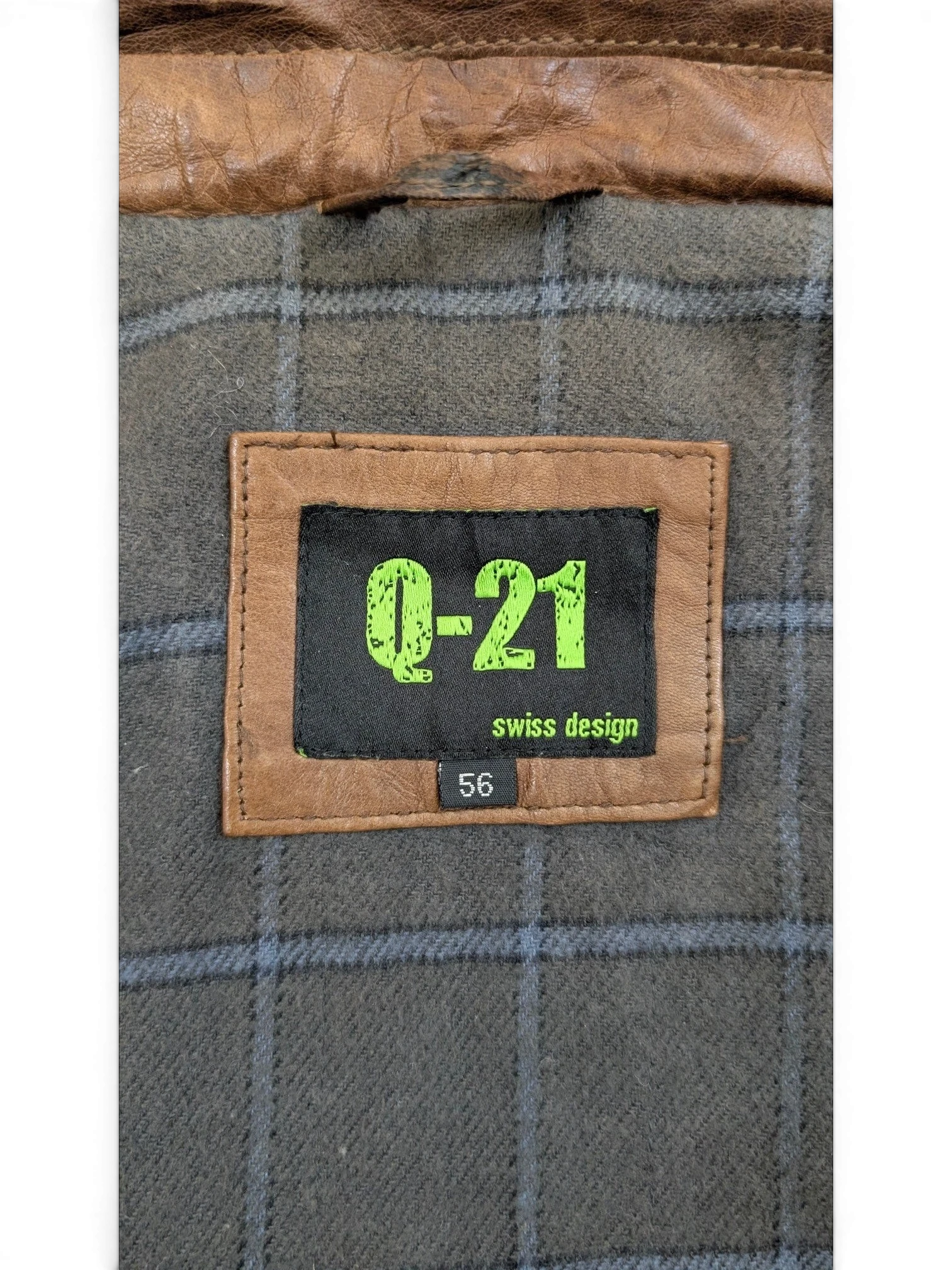JAKE & IPI Q-21 leather jacket with plaid lining and size 56 tag.