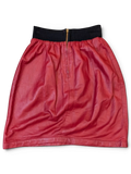 JAKE & IPI red faux leather mini skirt with a black ribbed elastic waistband and front gold zipper detail.