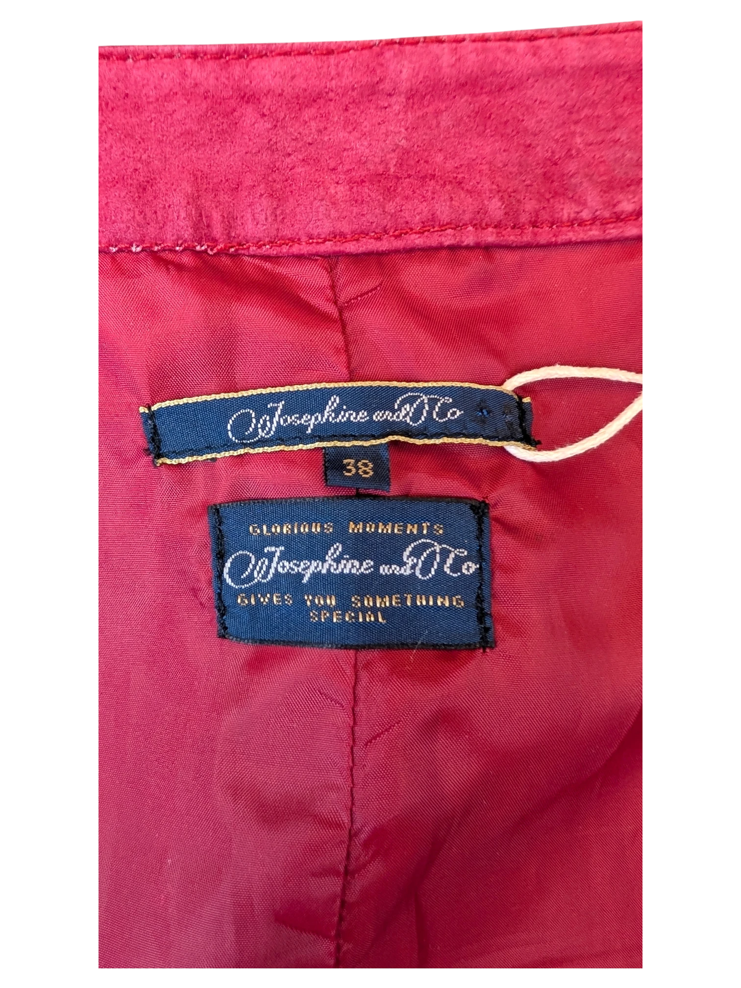 JAKE & IPI Josephine's and Co red suede leather skirt interior with size 38 label and brand tags.
