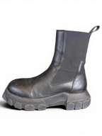 JAKE & IPI Rick Owens Beatle Bozo Tractor boots in metallic black leather with an oversized lug sole side view