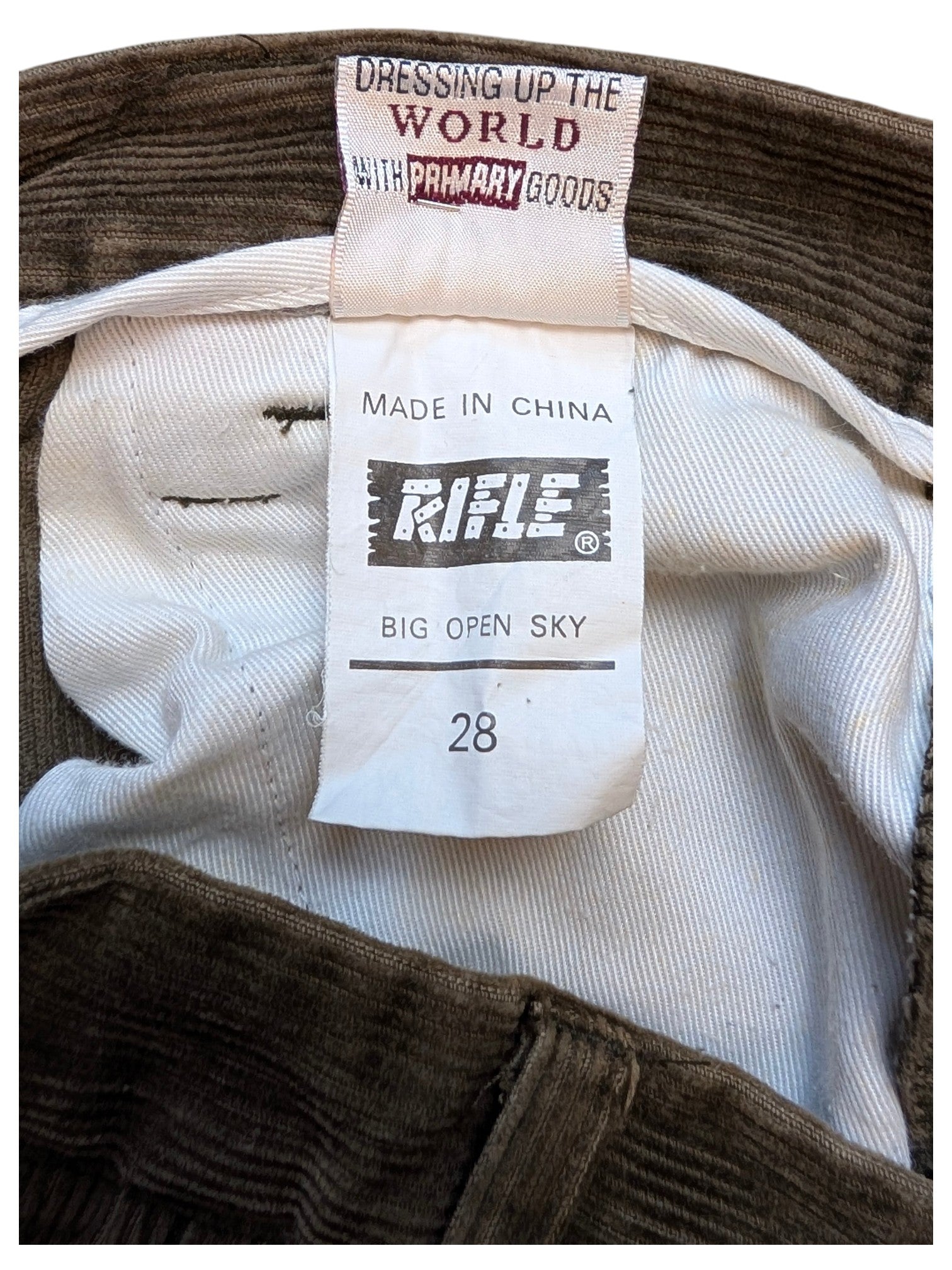 JAKE & IPI RIFLE corduroy cargo pants in brown, size 28. Features a white inner lining and care labels.