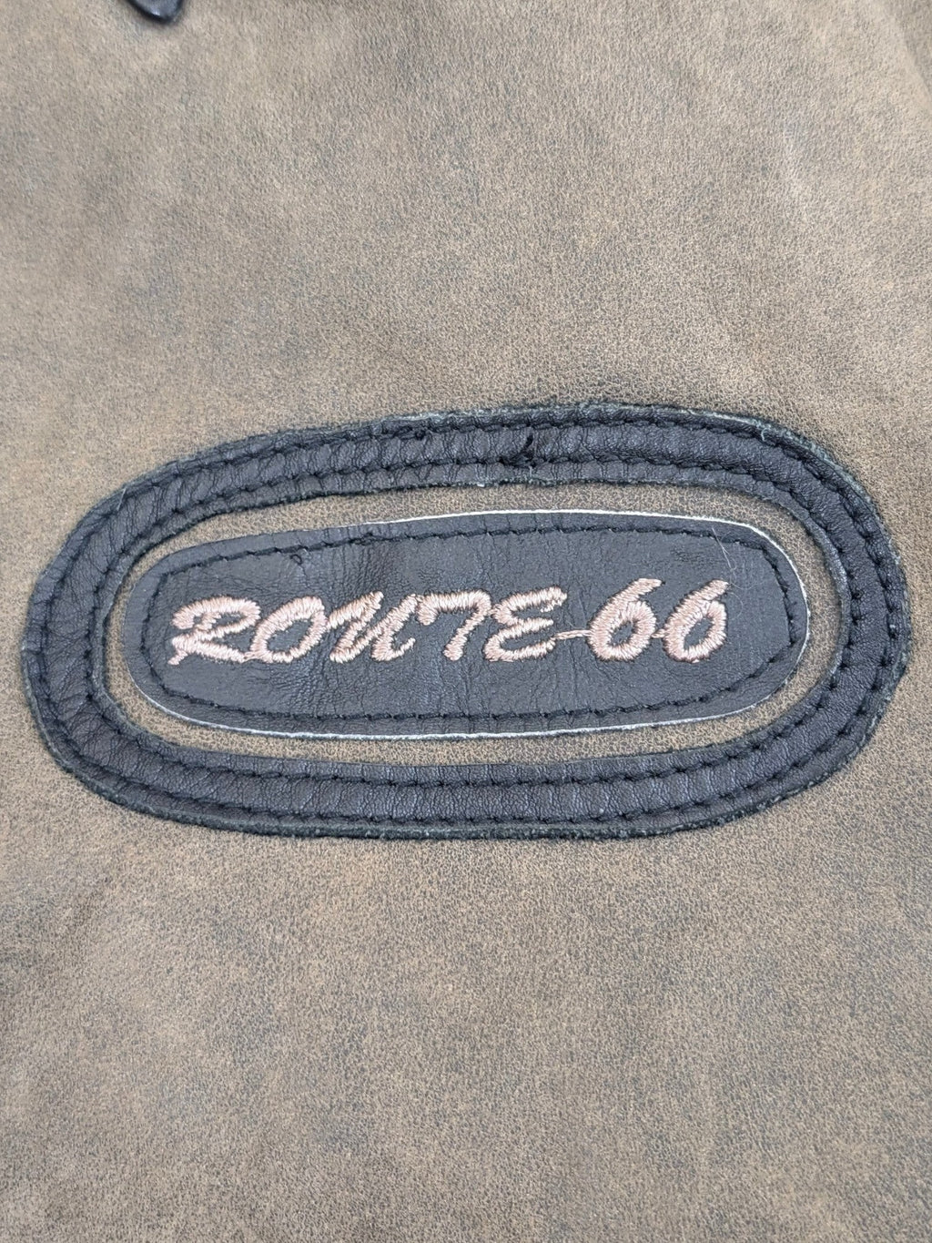 JAKE & IPI Route 66 leather jacket in distressed brown with embroidered oval patch.