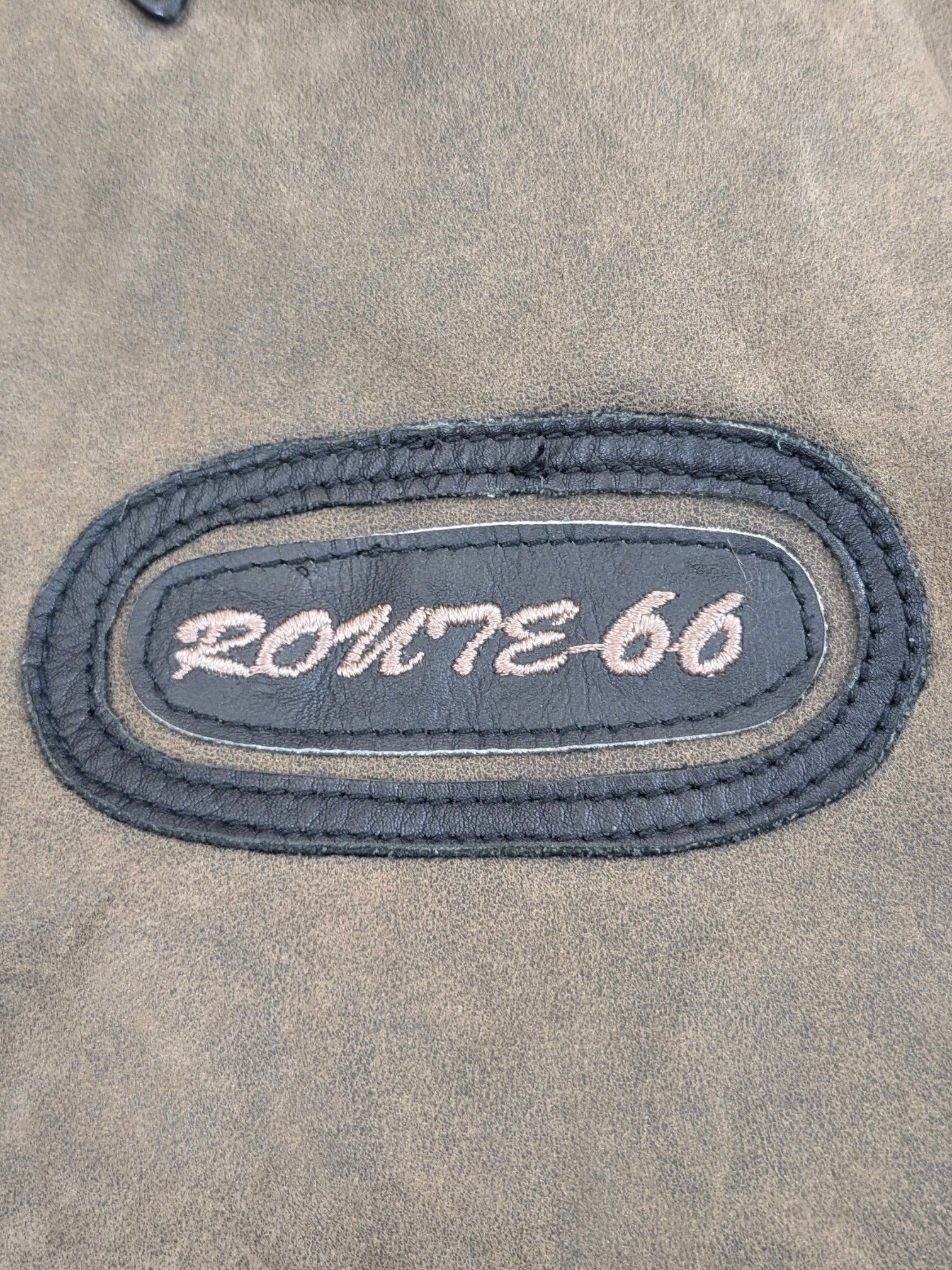 JAKE & IPI Route 66 leather jacket in distressed brown with embroidered oval patch.
