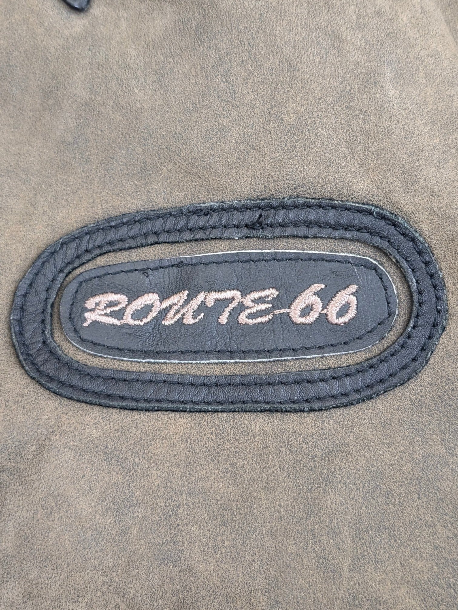 JAKE & IPI Route 66 leather jacket in distressed brown with embroidered oval patch.