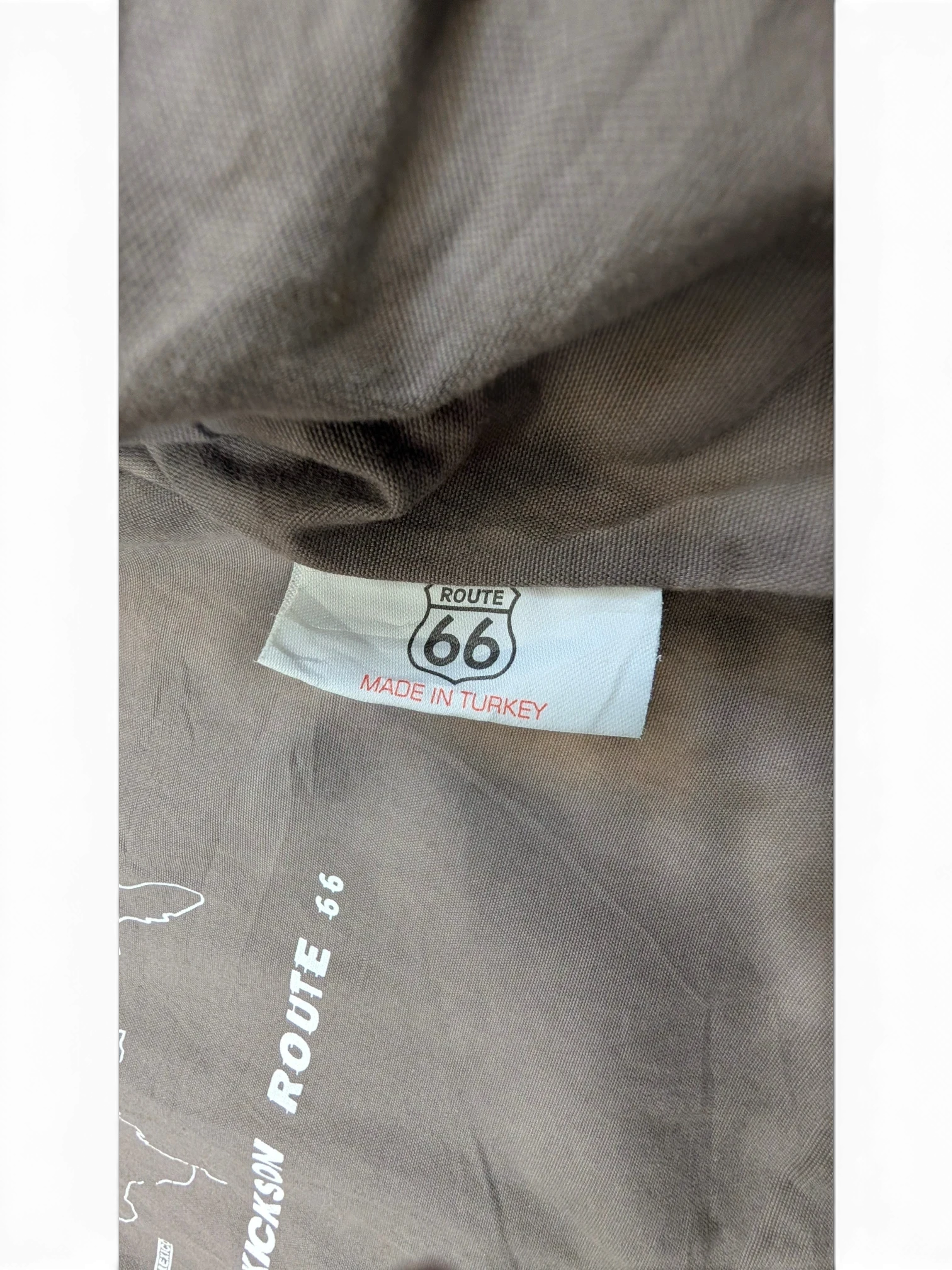 JAKE & IPI Route 66 leather jacket with "Made in Turkey" label and map graphic.