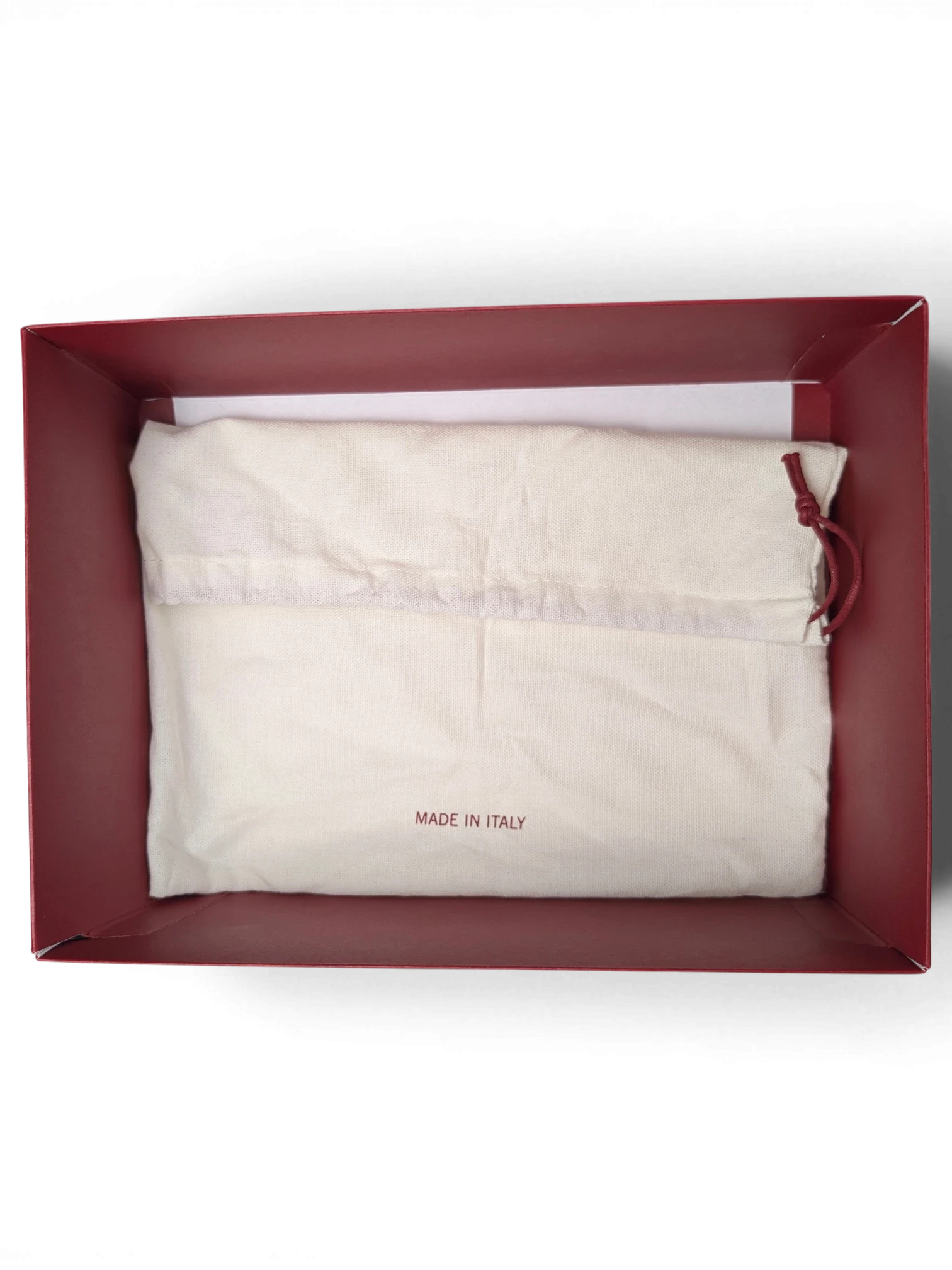 JAKE & IPI Salvatore Ferragamo messenger bag protective cotton dust bag inside a burgundy branded gift box