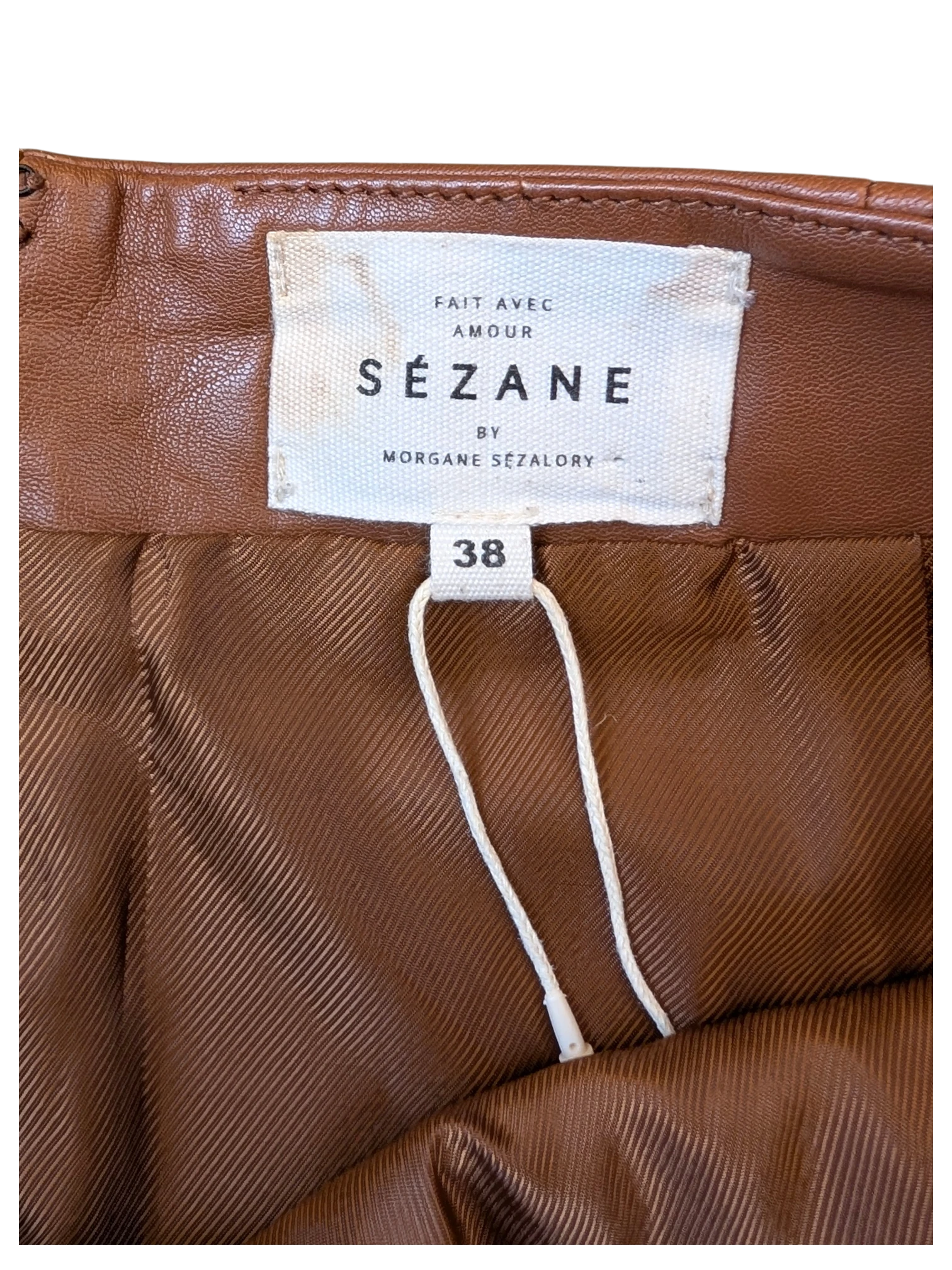 JAKE & IPI brown leather Sézane skirt with size 38 tag and interior lining detail.