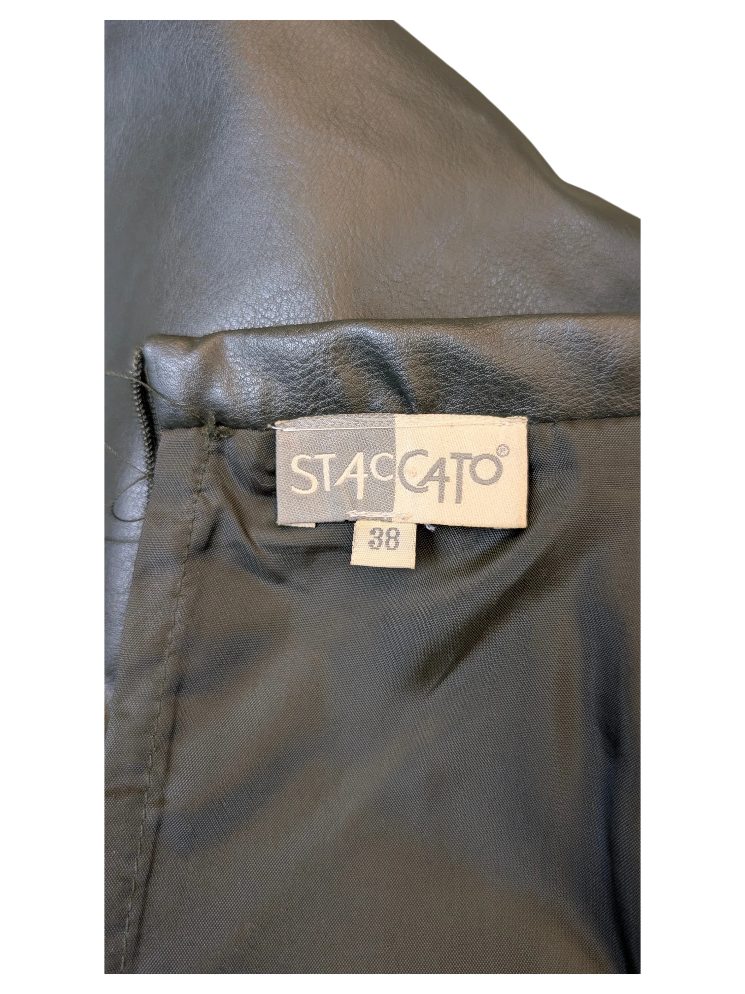 JAKE & IPI Staccato black faux leather midi skirt with interior brand label and size 38 tag.