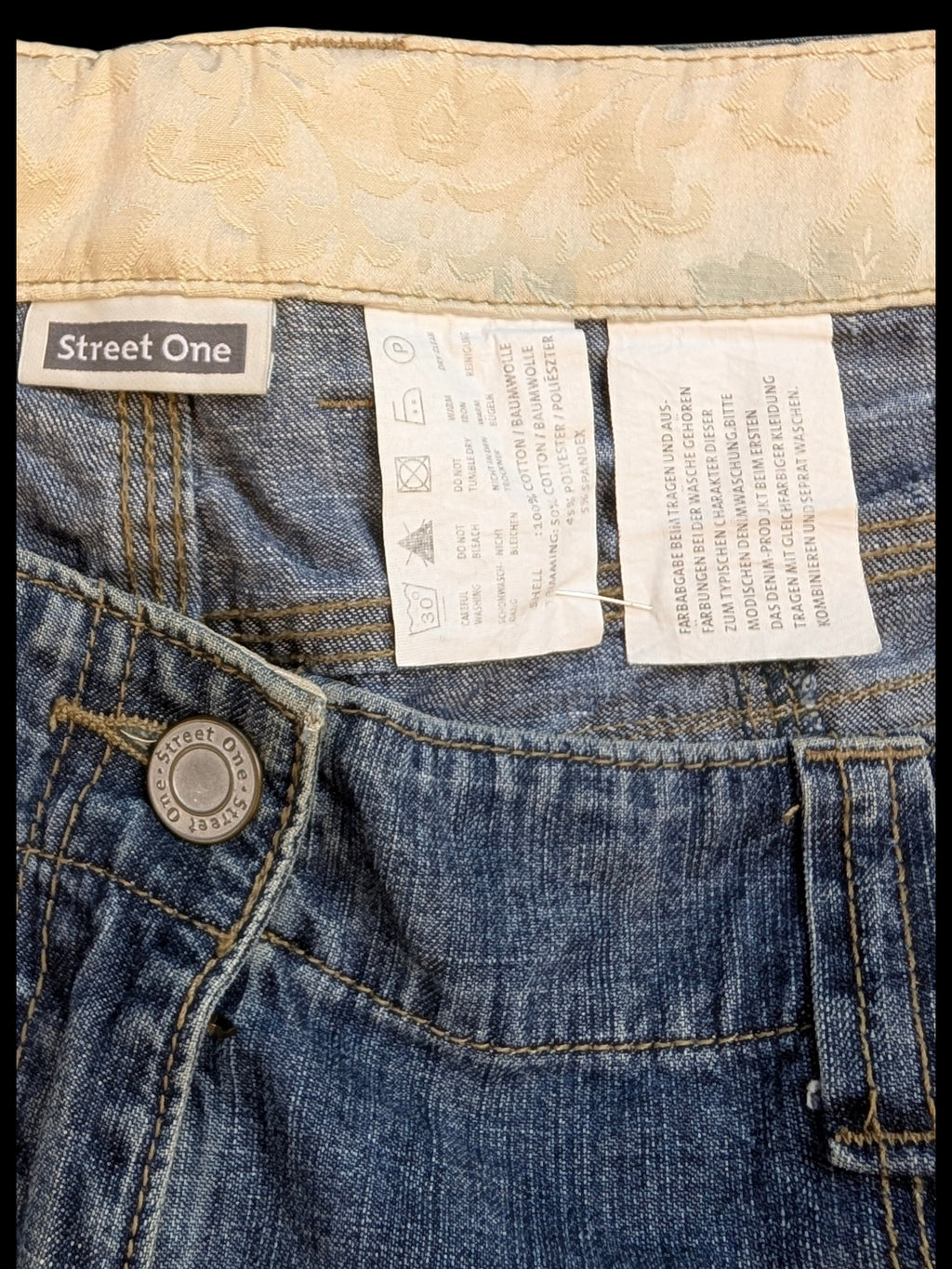 JAKE & IPI Street One blue denim cargo pants with decorative waistband and button closure.