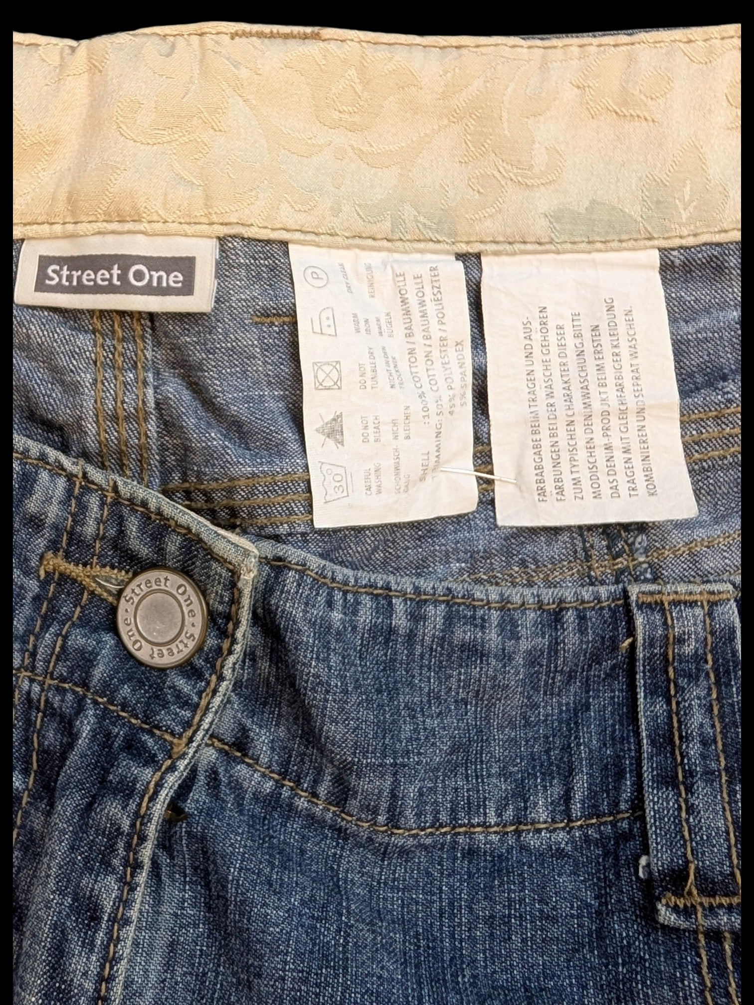 JAKE & IPI Street One blue denim cargo pants with decorative waistband and button closure.
