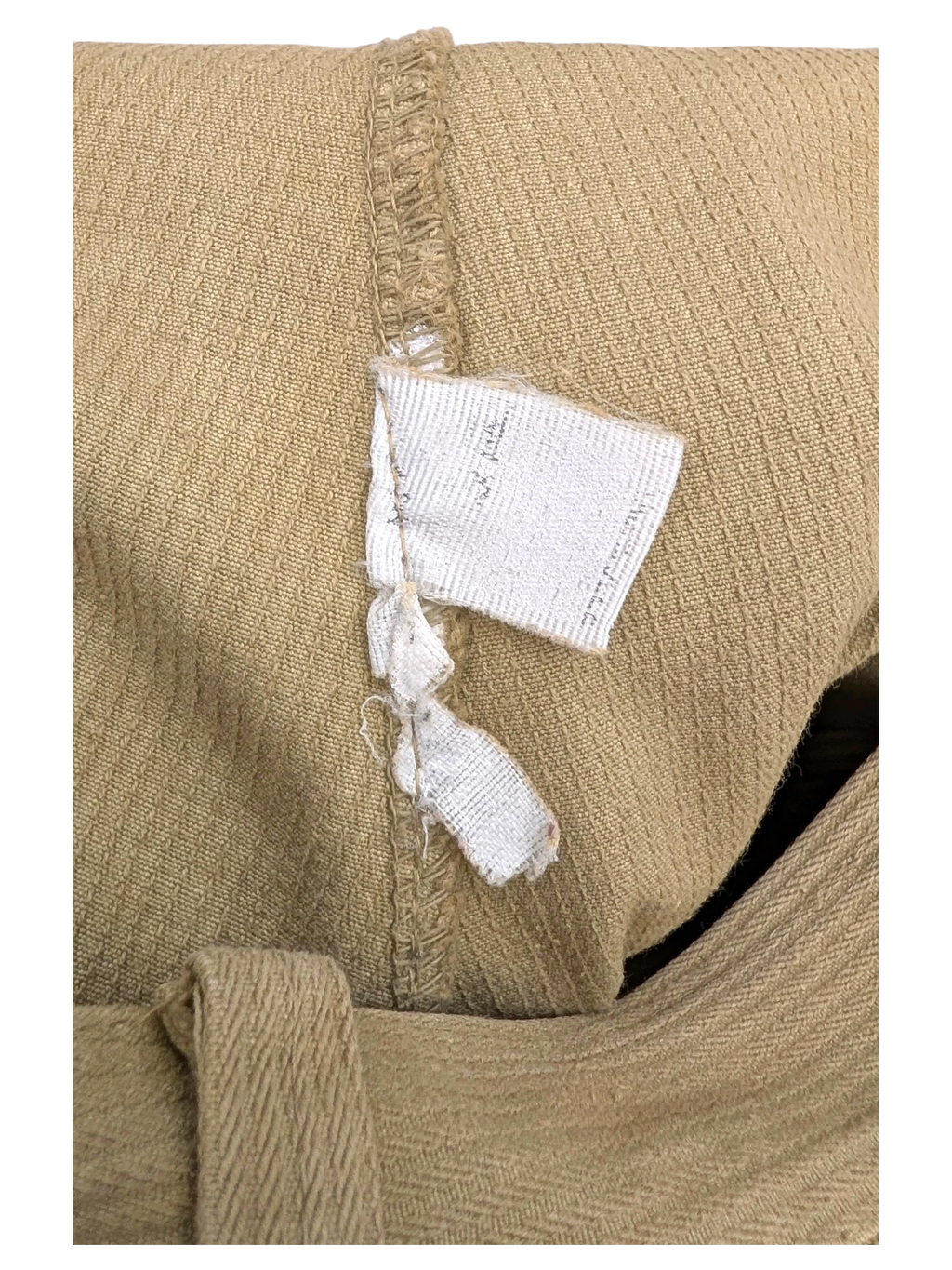 JAKE & IPI tan corduroy cargo pants with visible stitching and a torn care tag.