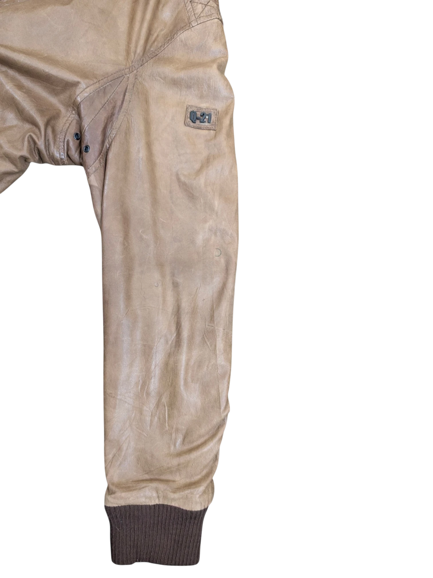 JAKE & IPI tan distressed leather bomber jacket with ribbed cuffs and a "Q-21" logo patch.