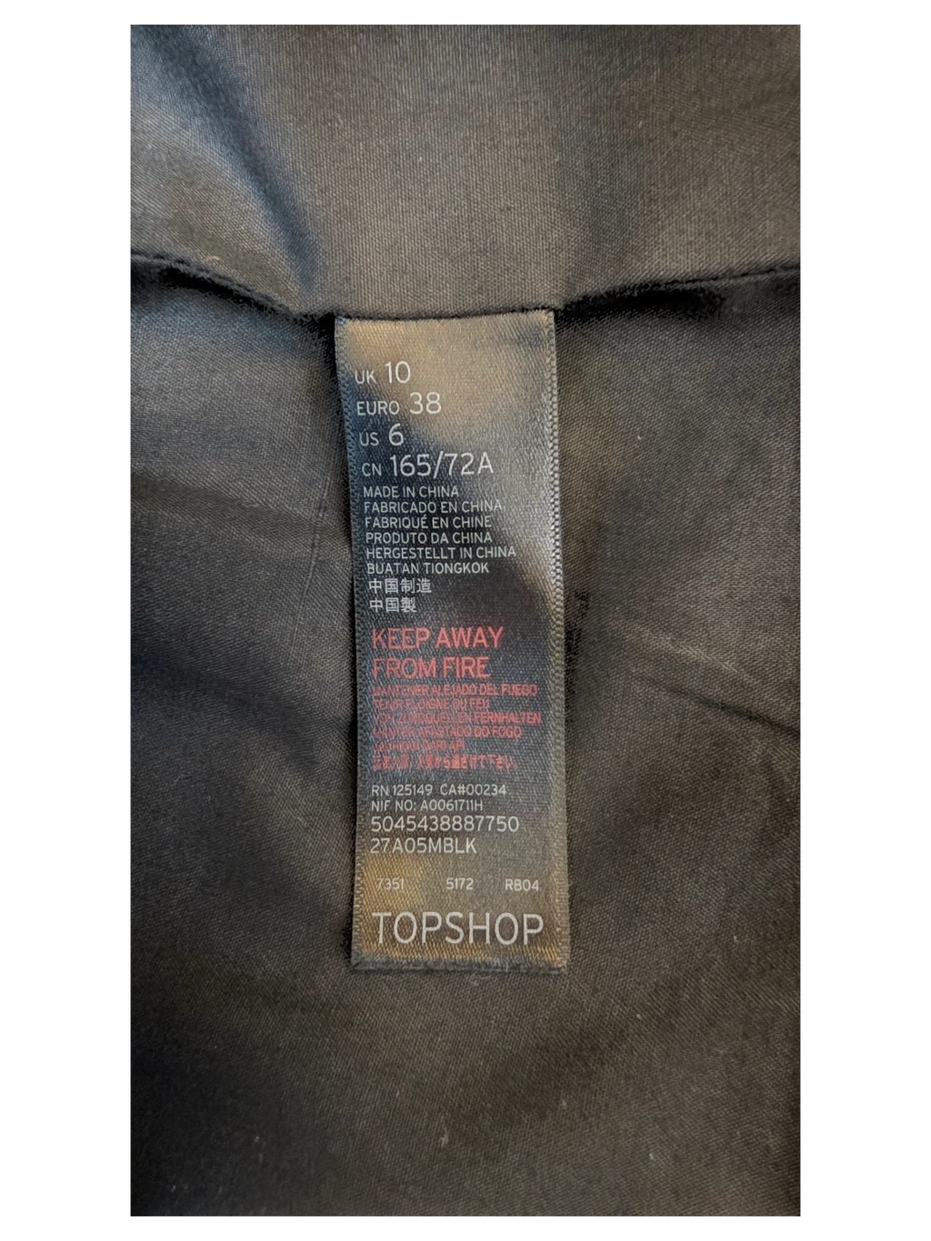 JAKE & IPI TOPSHOP black faux leather mini skirt garment care label showing size UK 10 and US 6