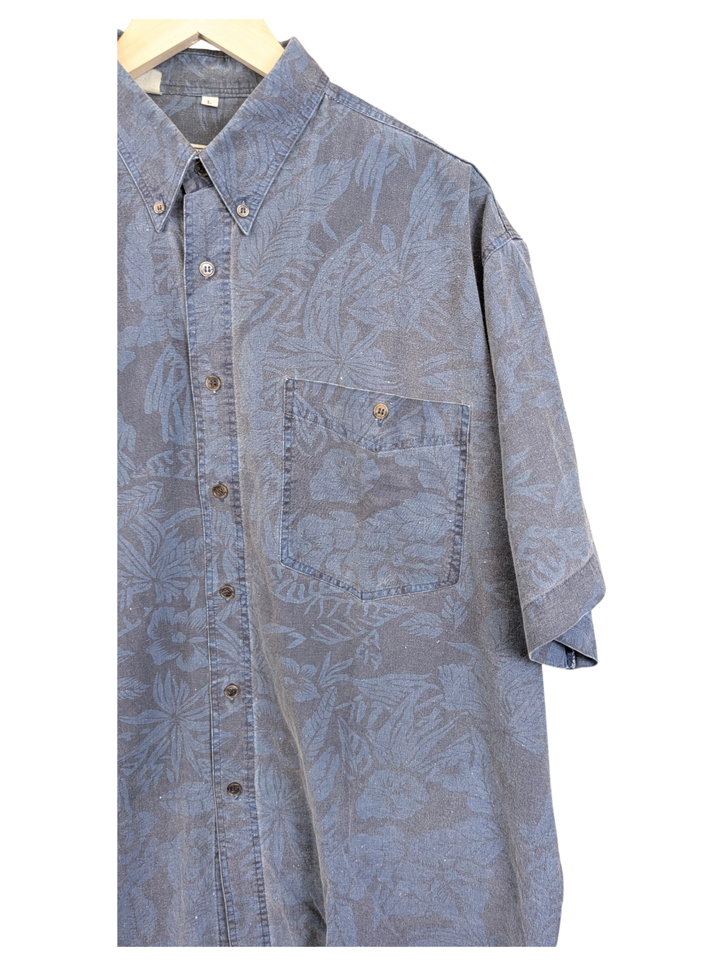 JAKE & IPI vintage 90s blue Hawaiian shirt with a subtle floral print, button-down collar, and chest pocket.