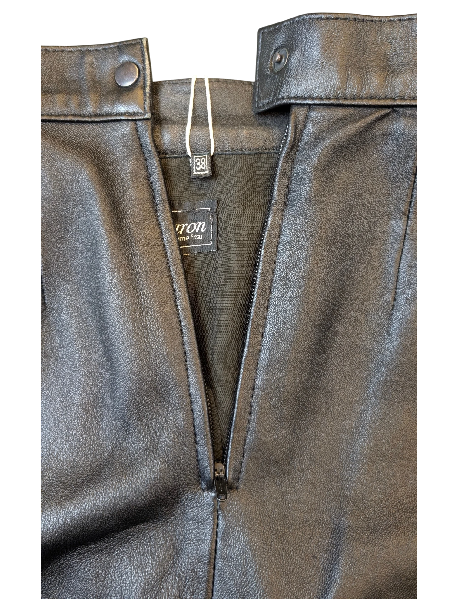 JAKE & IPI Vivien Caron black leather skirt with front zipper closure and snap button waistband.