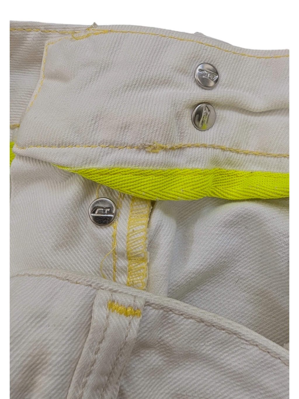 JAKE & IPI white denim jeans with yellow stitching and neon yellow accent band. Features metal button closure.