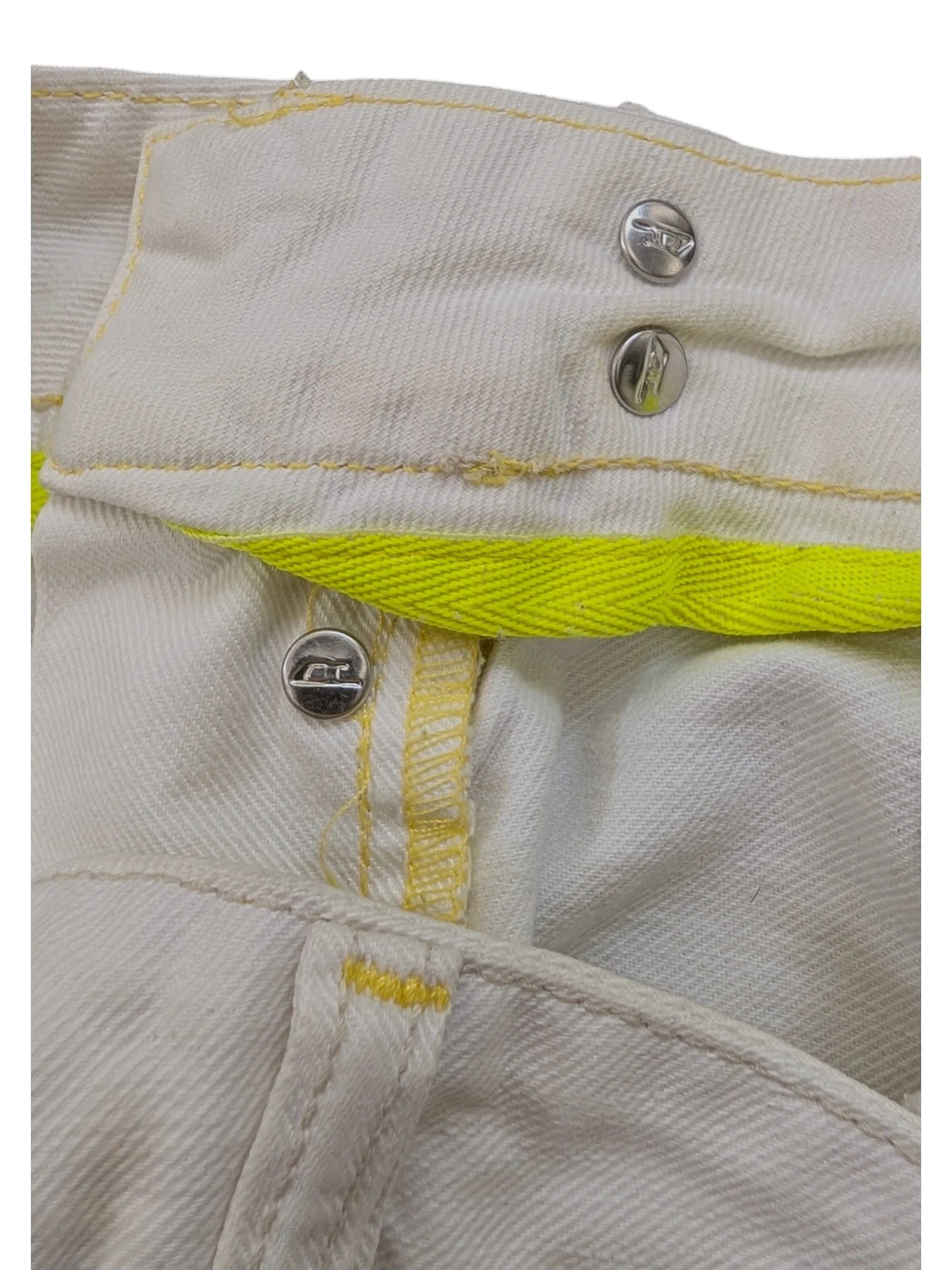 JAKE & IPI white denim jeans with yellow stitching and neon yellow accent band. Features metal button closure.