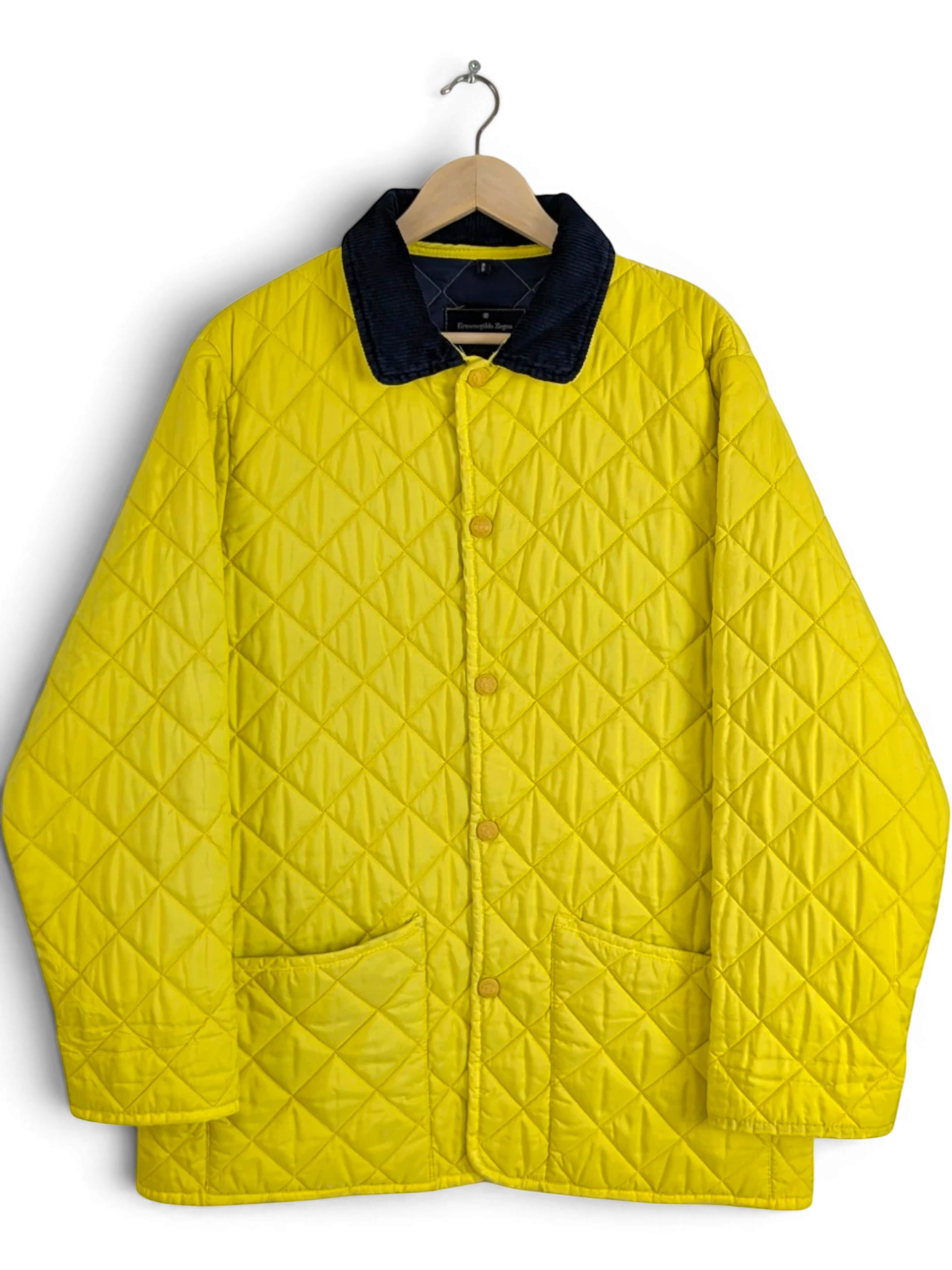JAKE & IPI bright yellow quilted jacket with navy corduroy collar, size L. Diamond-quilted polyester with snap front and patch pockets.