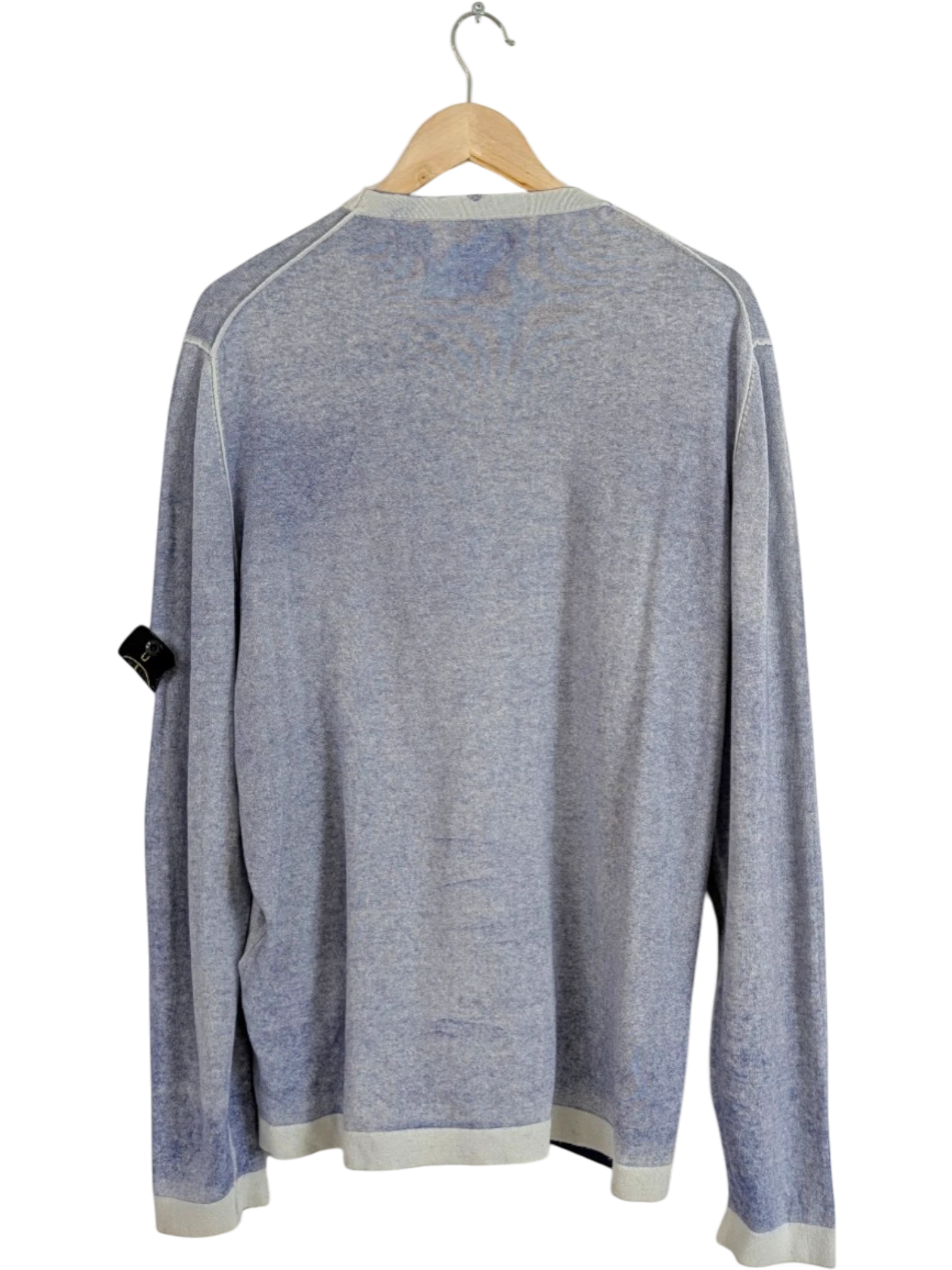 Stone Island blue mélange crewneck knit sweater with compass patch on sleeve and light grey ribbed trims. 100% cotton.