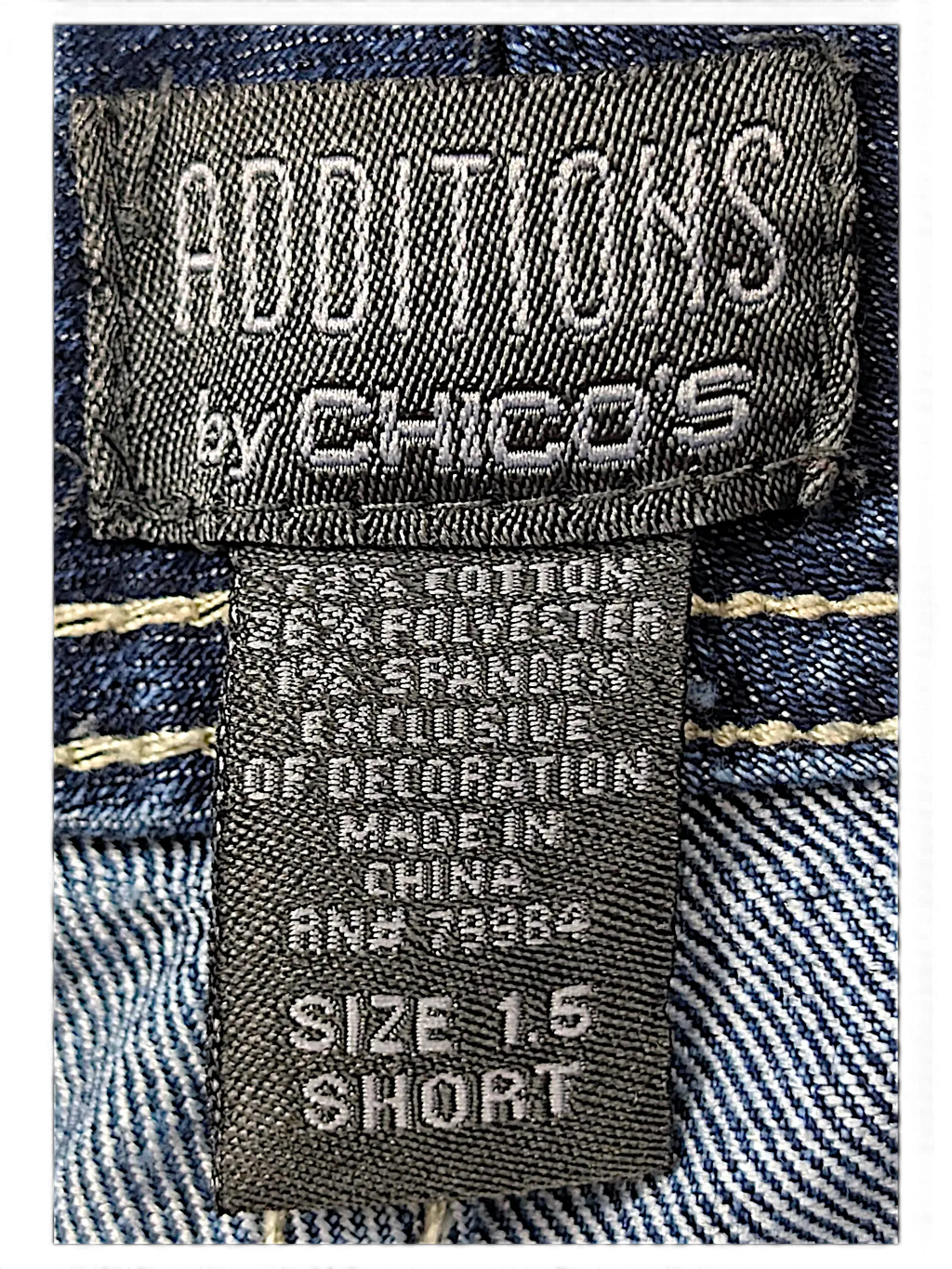 JAKE & IPI Additions by Chico's denim shorts size 1.5 clothing tag with fabric composition details