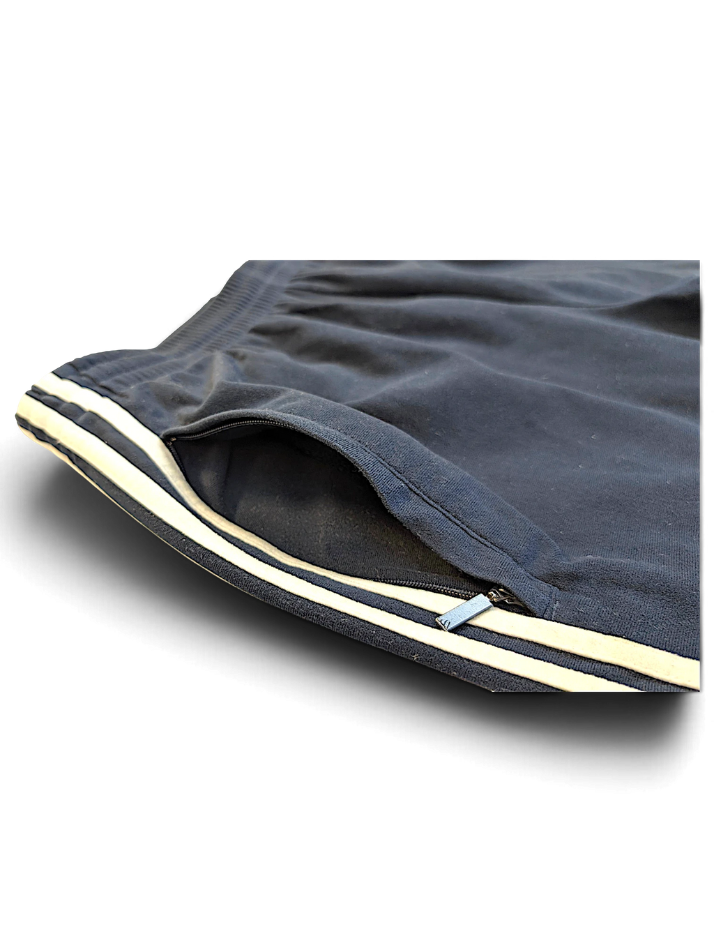 JAKE & IPI pre-owned blue adidas velour track pants featuring a zippered side pocket and classic white side stripes.