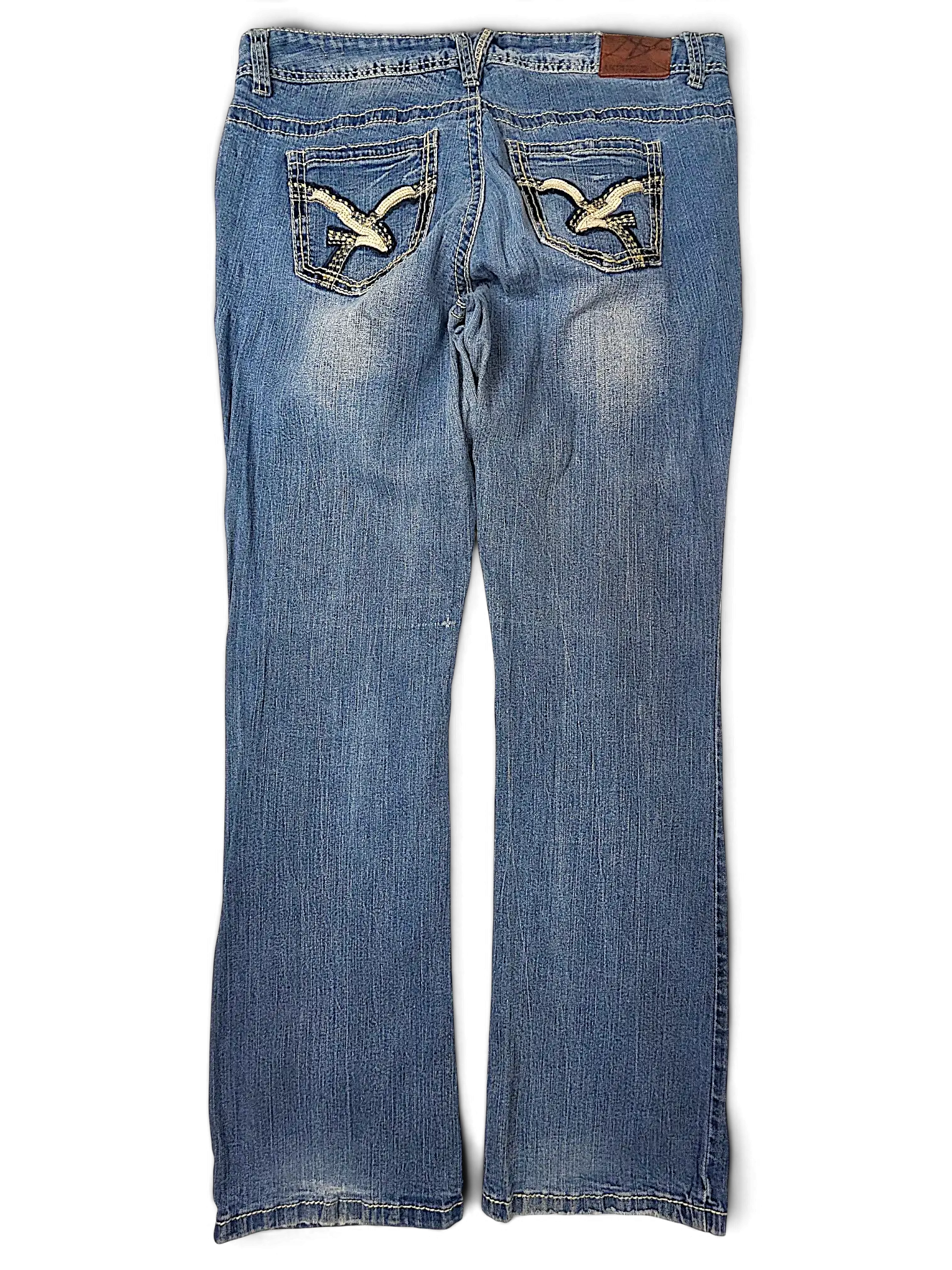JAKE & IPI Amethyst Y2K blue denim jeans with decorative embroidered back pockets and light wash fading