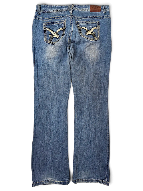 JAKE & IPI Amethyst Y2K blue denim jeans with decorative embroidered back pockets and light wash fading