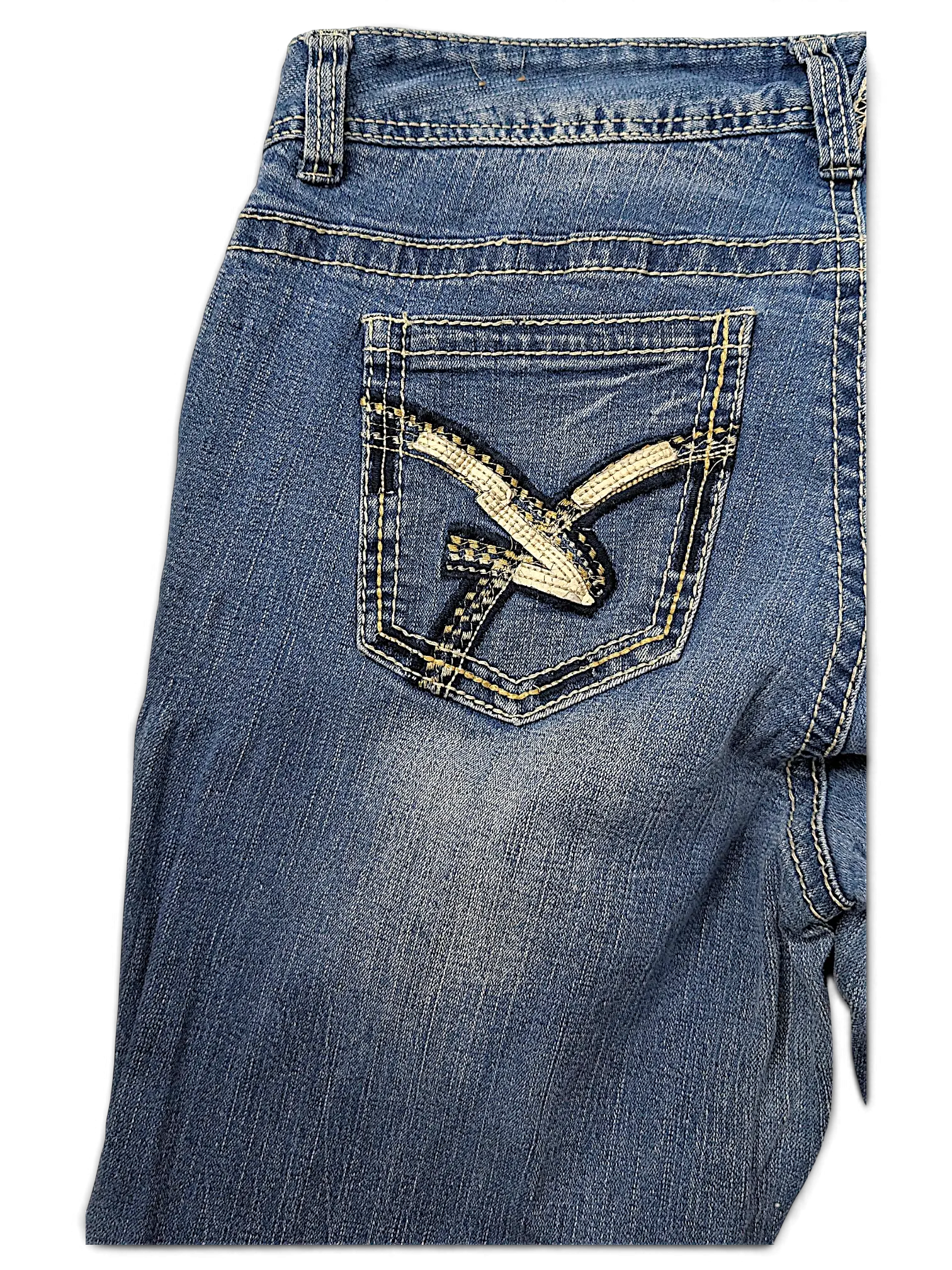 JAKE & IPI Amethyst Y2K jeans featuring a medium wash blue denim with a decorative stitched arrow back pocket design.