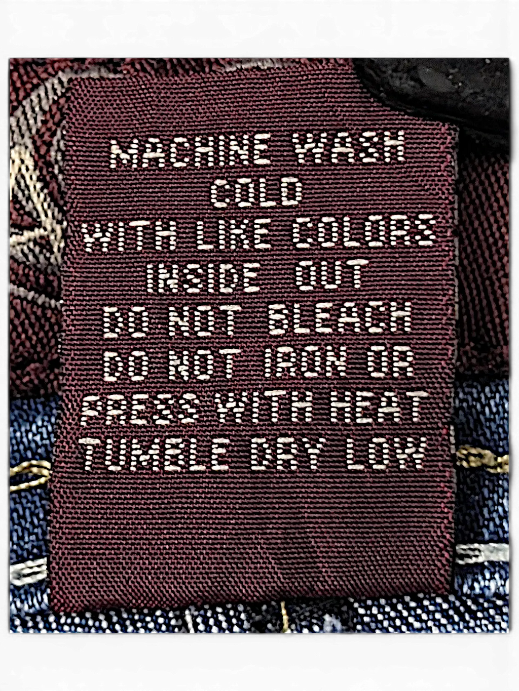 JAKE & IPI Angels Y2K jeans featuring a brown interior care label with white text and contrast stitching