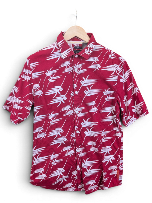 JAKE & IPI Armani Jeans red short-sleeve button-down shirt featuring a white tropical leaf print on a hanger.