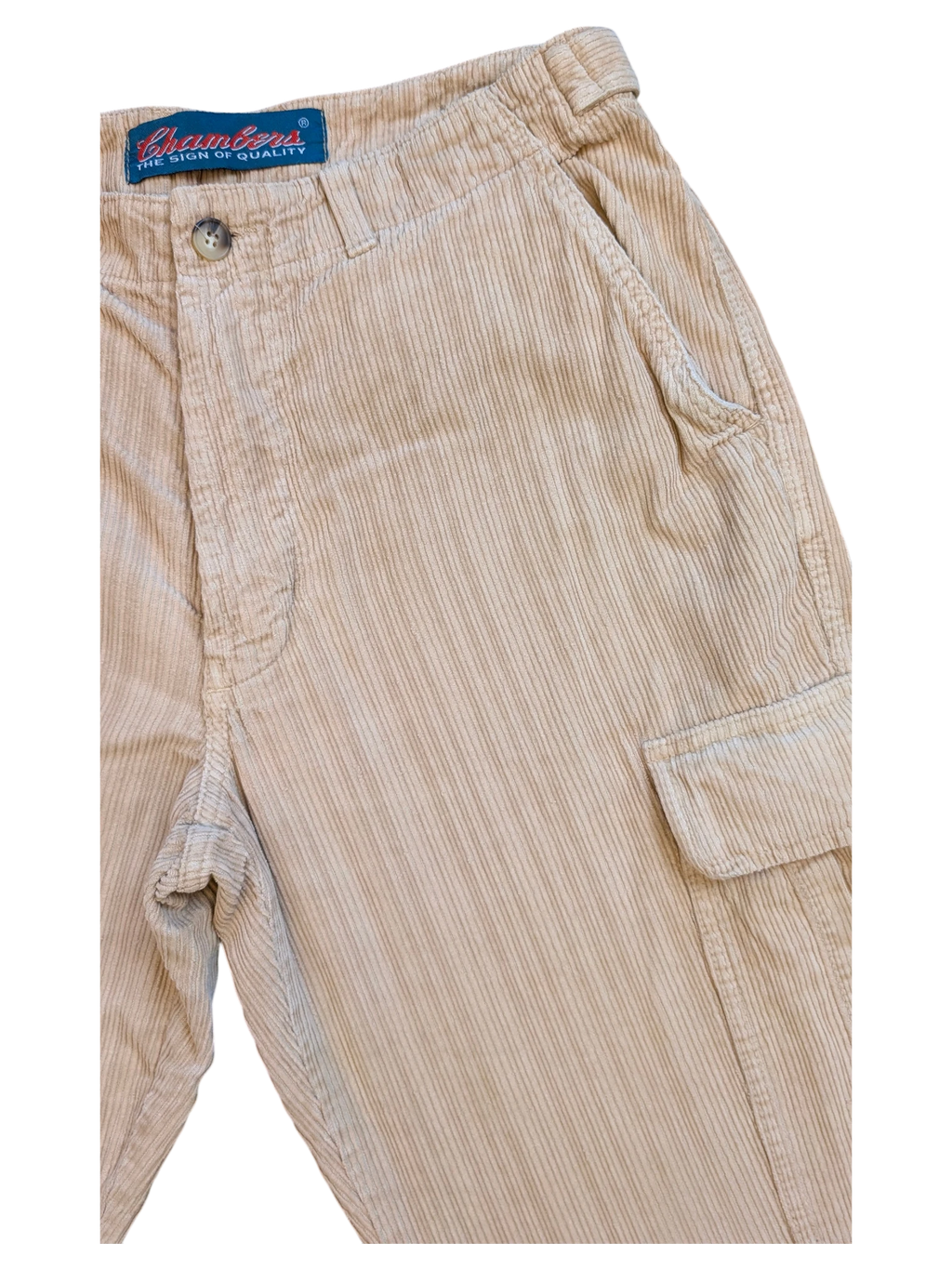 JAKE & IPI beige corduroy cargo pants with button fly and multiple pockets. The fabric has fine vertical wales.