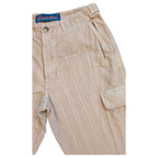 JAKE & IPI beige corduroy cargo pants with button fly and multiple pockets. The fabric has fine vertical wales.